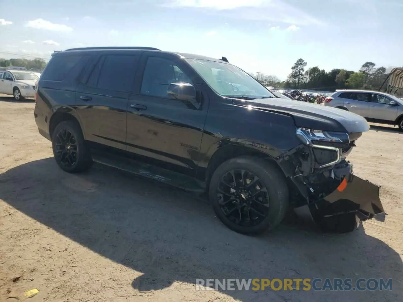 4 Photograph of a damaged car 1GNSKRKL2PR442337 CHEVROLET TAHOE 2023