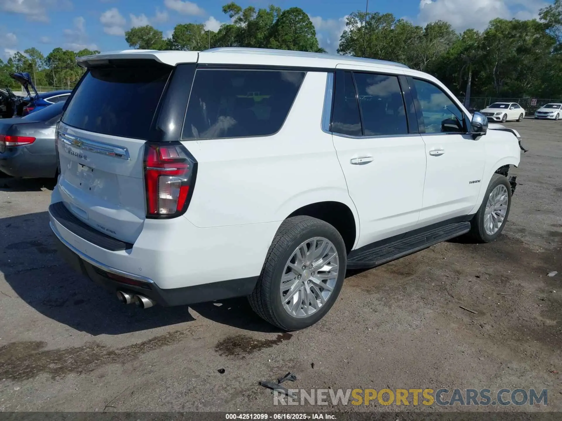 4 Photograph of a damaged car 1GNSKSKD0PR453465 CHEVROLET TAHOE 2023