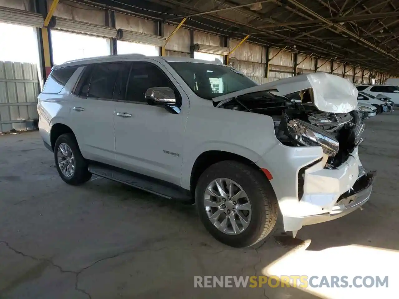 4 Photograph of a damaged car 1GNSKSKD2PR497726 CHEVROLET TAHOE 2023