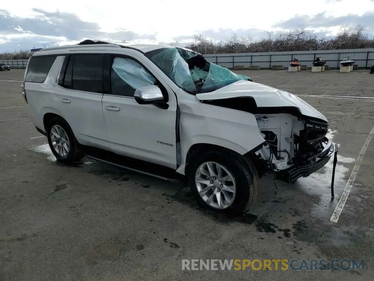 4 Photograph of a damaged car 1GNSKSKD8PR283310 CHEVROLET TAHOE 2023