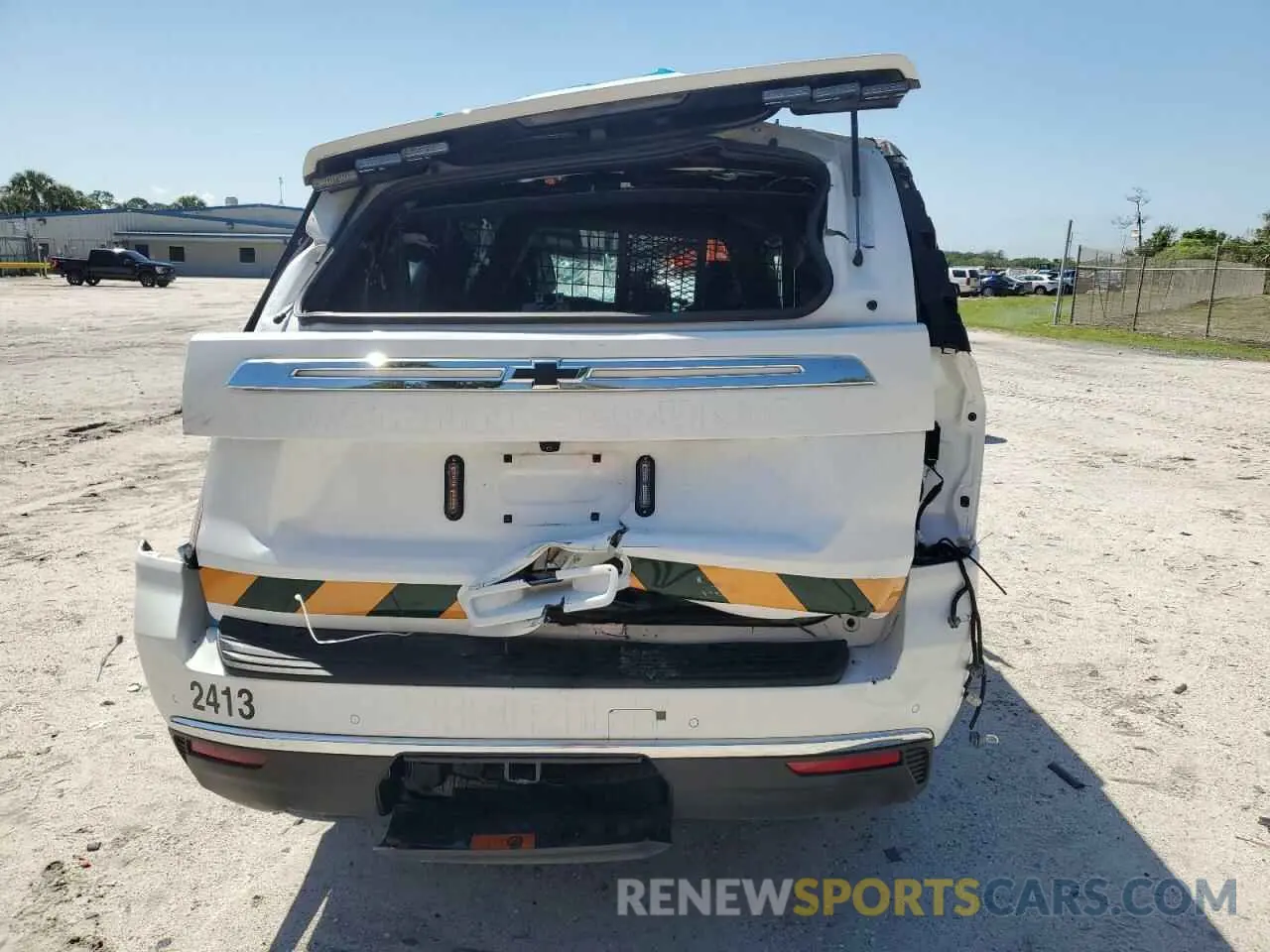 6 Photograph of a damaged car 1GNSCLED1RR176018 CHEVROLET TAHOE 2024