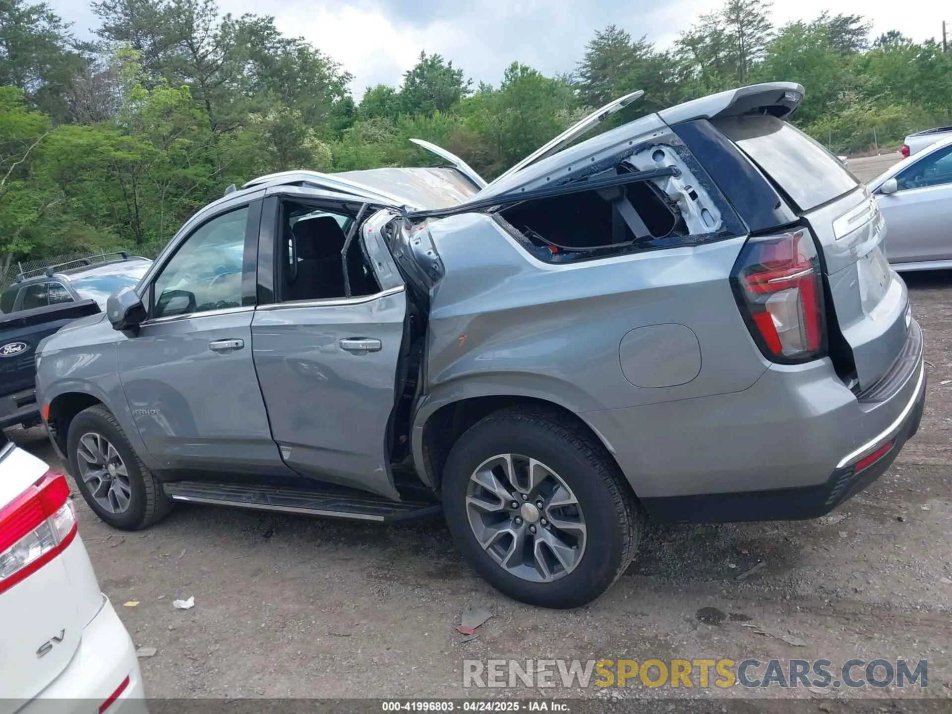 14 Photograph of a damaged car 1GNSCMKD1RR300119 CHEVROLET TAHOE 2024
