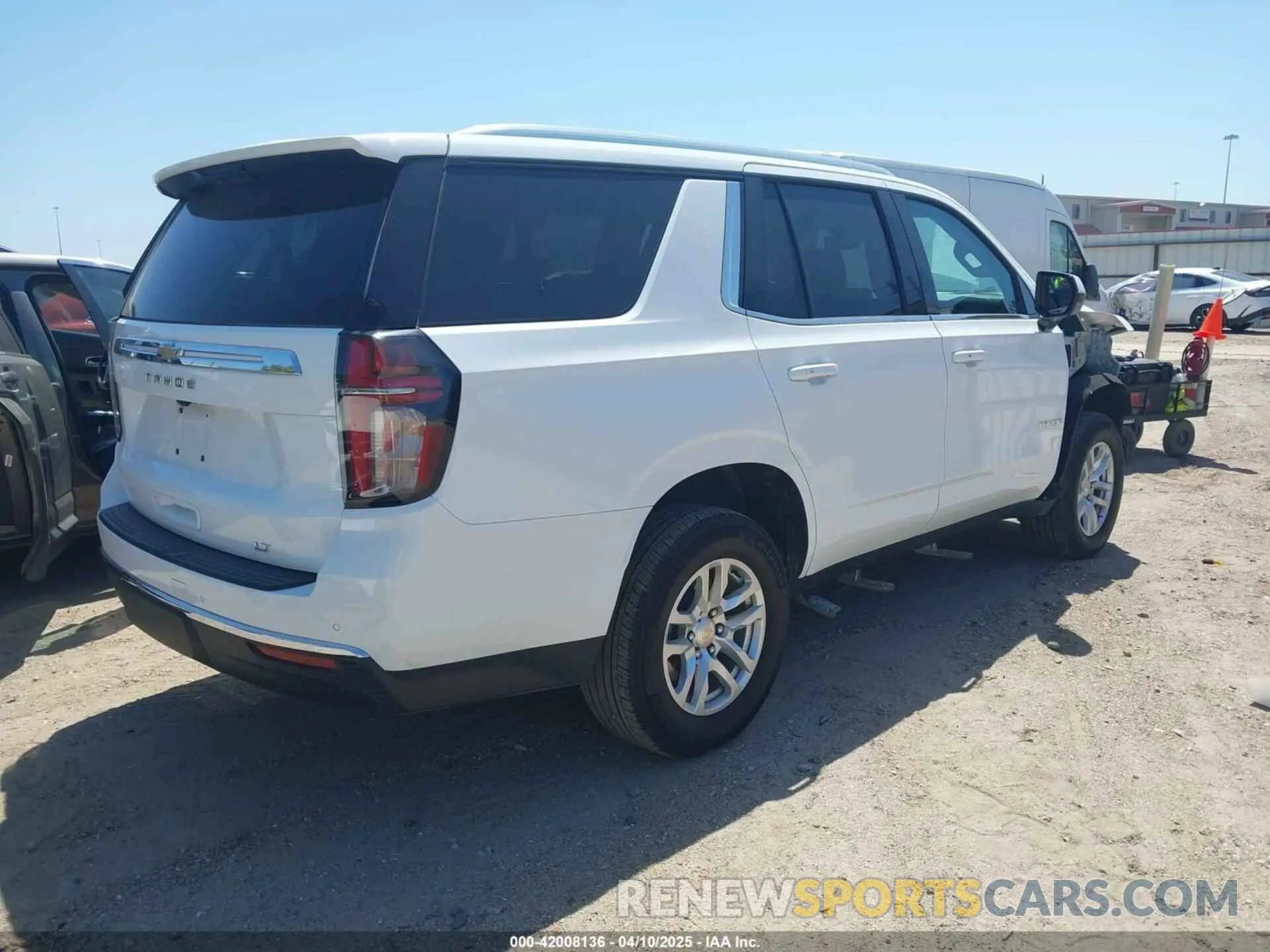 4 Photograph of a damaged car 1GNSCNKD2RR242589 CHEVROLET TAHOE 2024
