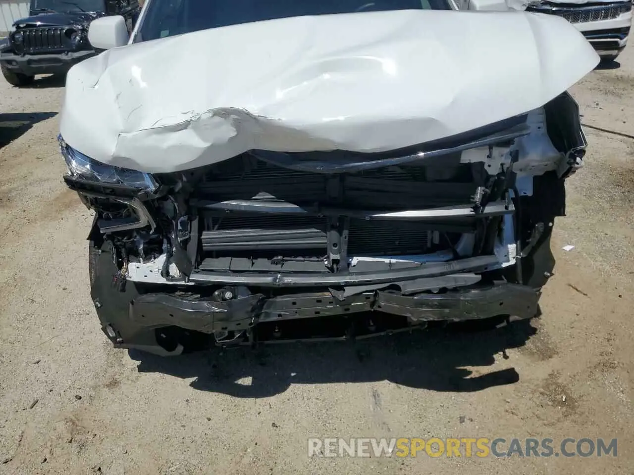 12 Photograph of a damaged car 1GNSCNKD5RR243042 CHEVROLET TAHOE 2024