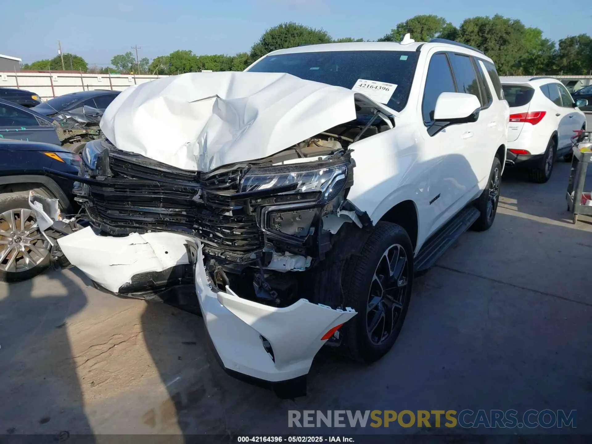 2 Photograph of a damaged car 1GNSCRKD3RR340893 CHEVROLET TAHOE 2024