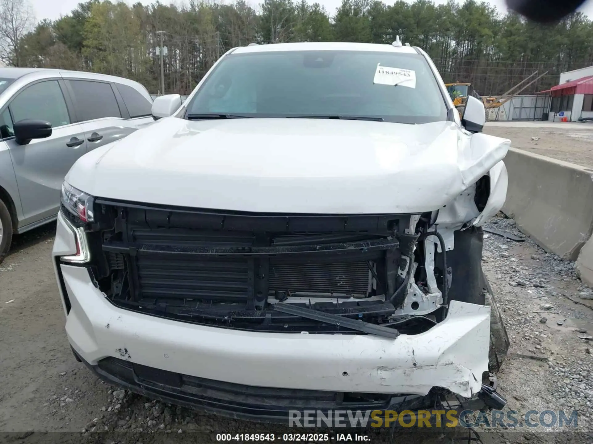 12 Photograph of a damaged car 1GNSCRKD5RR388203 CHEVROLET TAHOE 2024