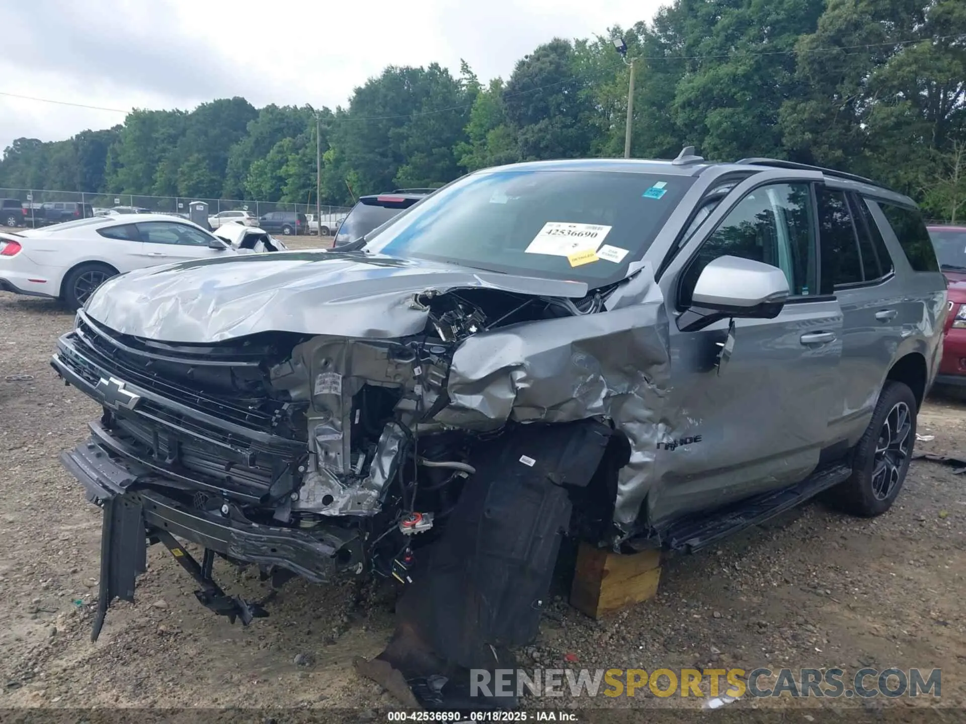 6 Photograph of a damaged car 1GNSCRKDXRR395888 CHEVROLET TAHOE 2024