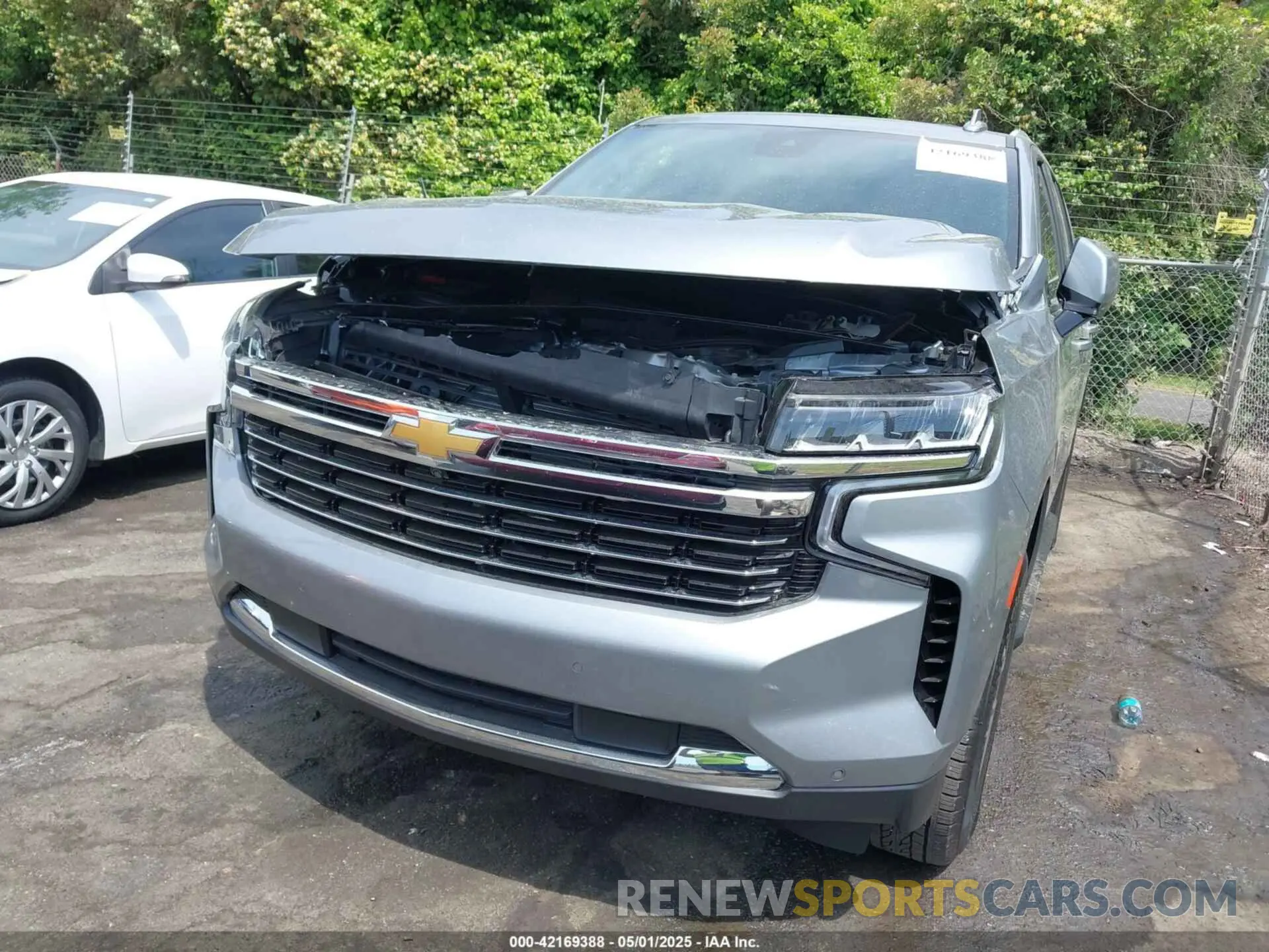 6 Photograph of a damaged car 1GNSKNKD1RR317799 CHEVROLET TAHOE 2024