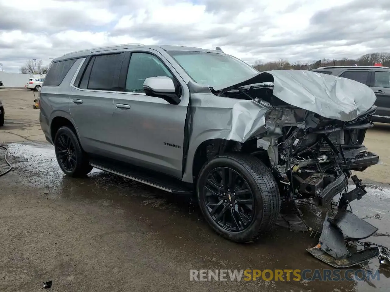 4 Photograph of a damaged car 1GNSKNKD4RR165517 CHEVROLET TAHOE 2024