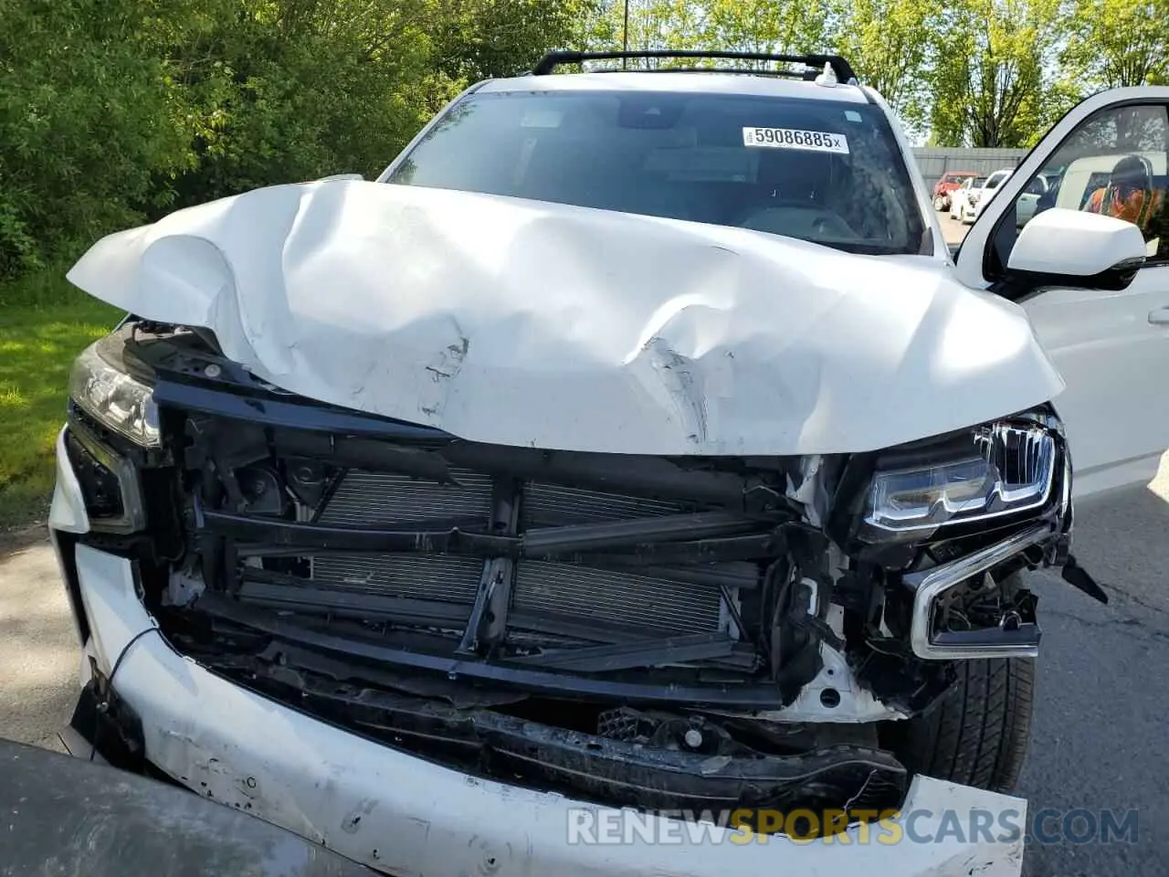 12 Photograph of a damaged car 1GNSKRKD6RR270468 CHEVROLET TAHOE 2024