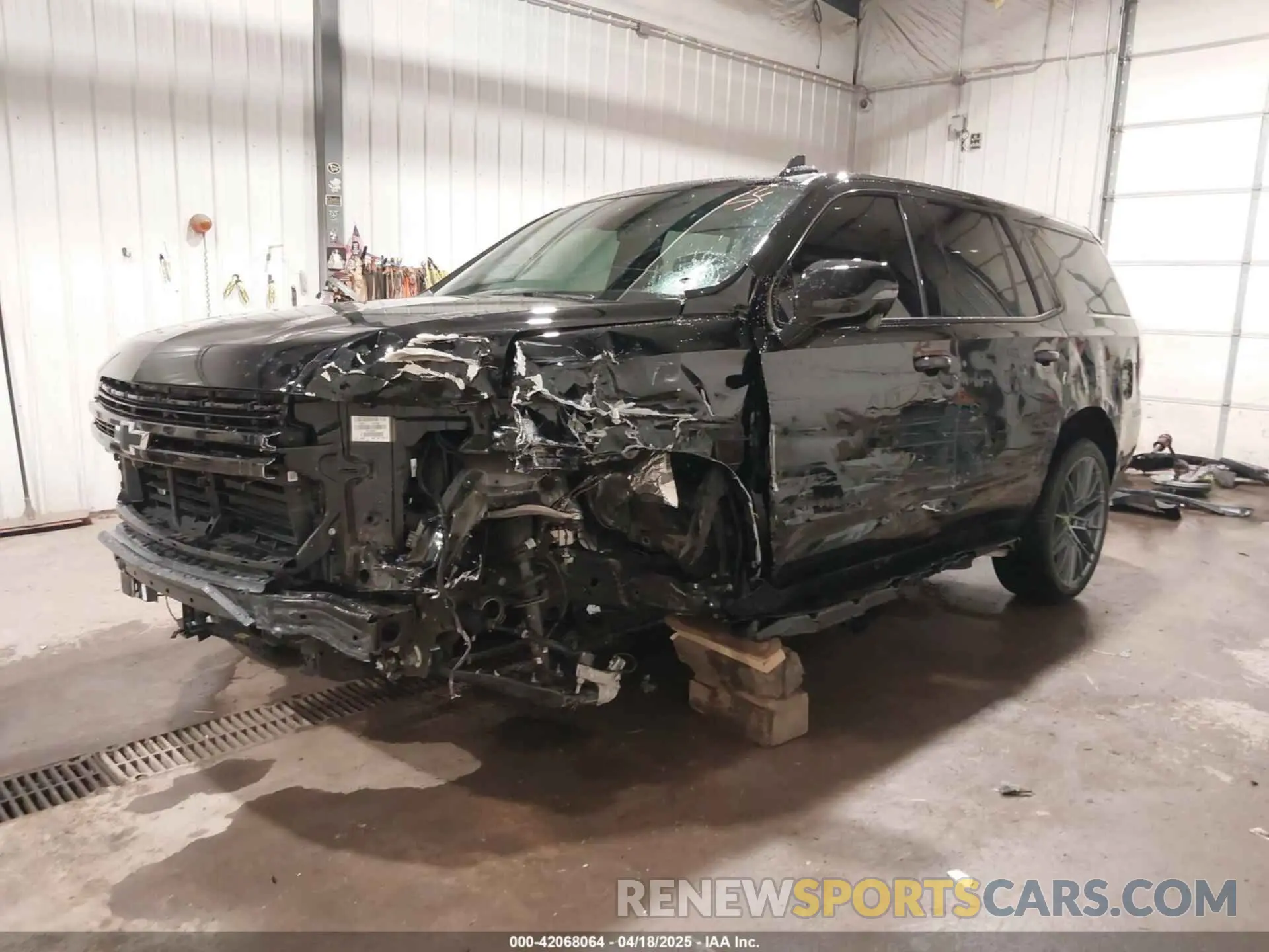2 Photograph of a damaged car 1GNSKRKL0RR292943 CHEVROLET TAHOE 2024