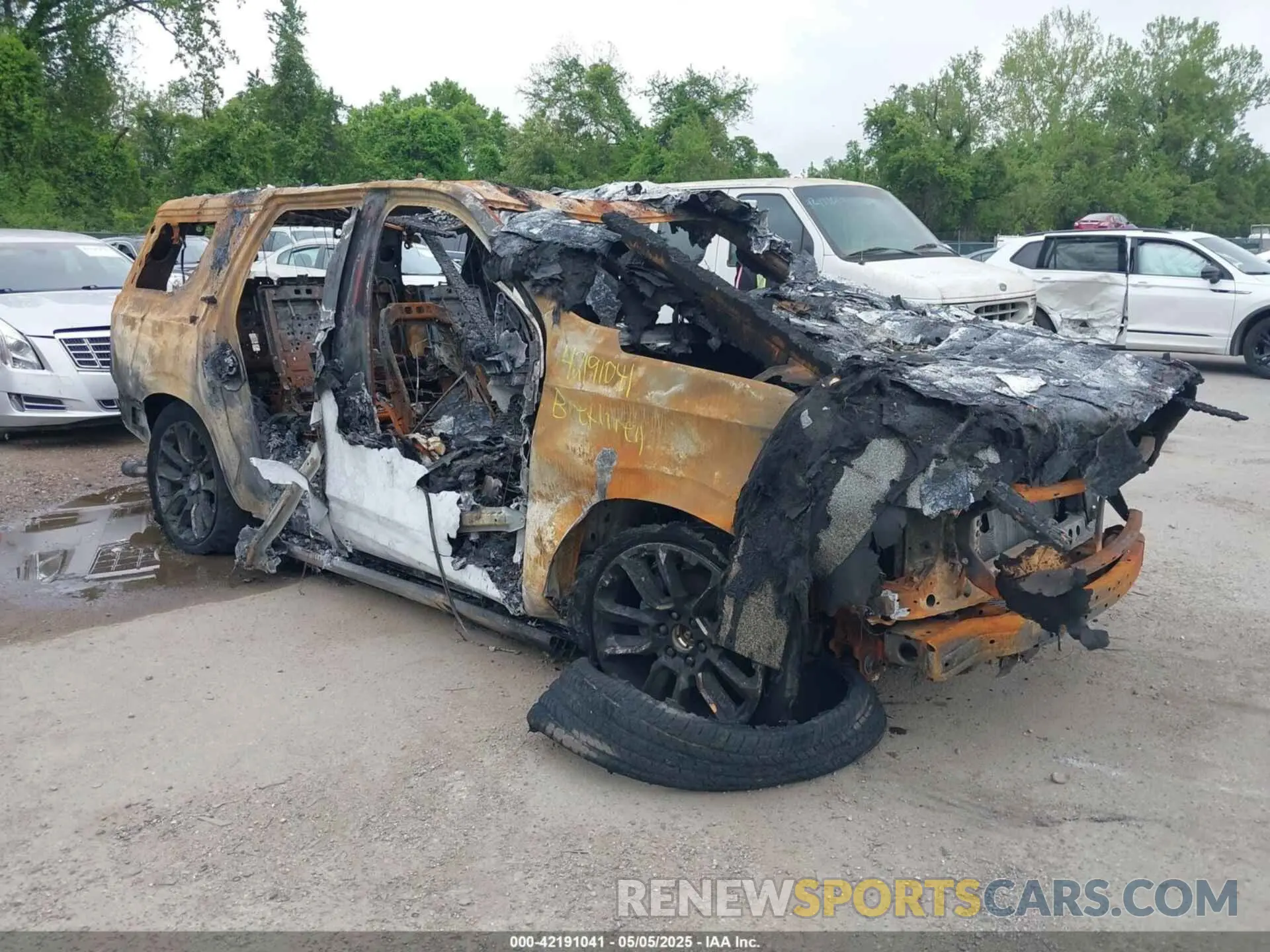 12 Photograph of a damaged car 1GNSKTKL1RR251945 CHEVROLET TAHOE 2024