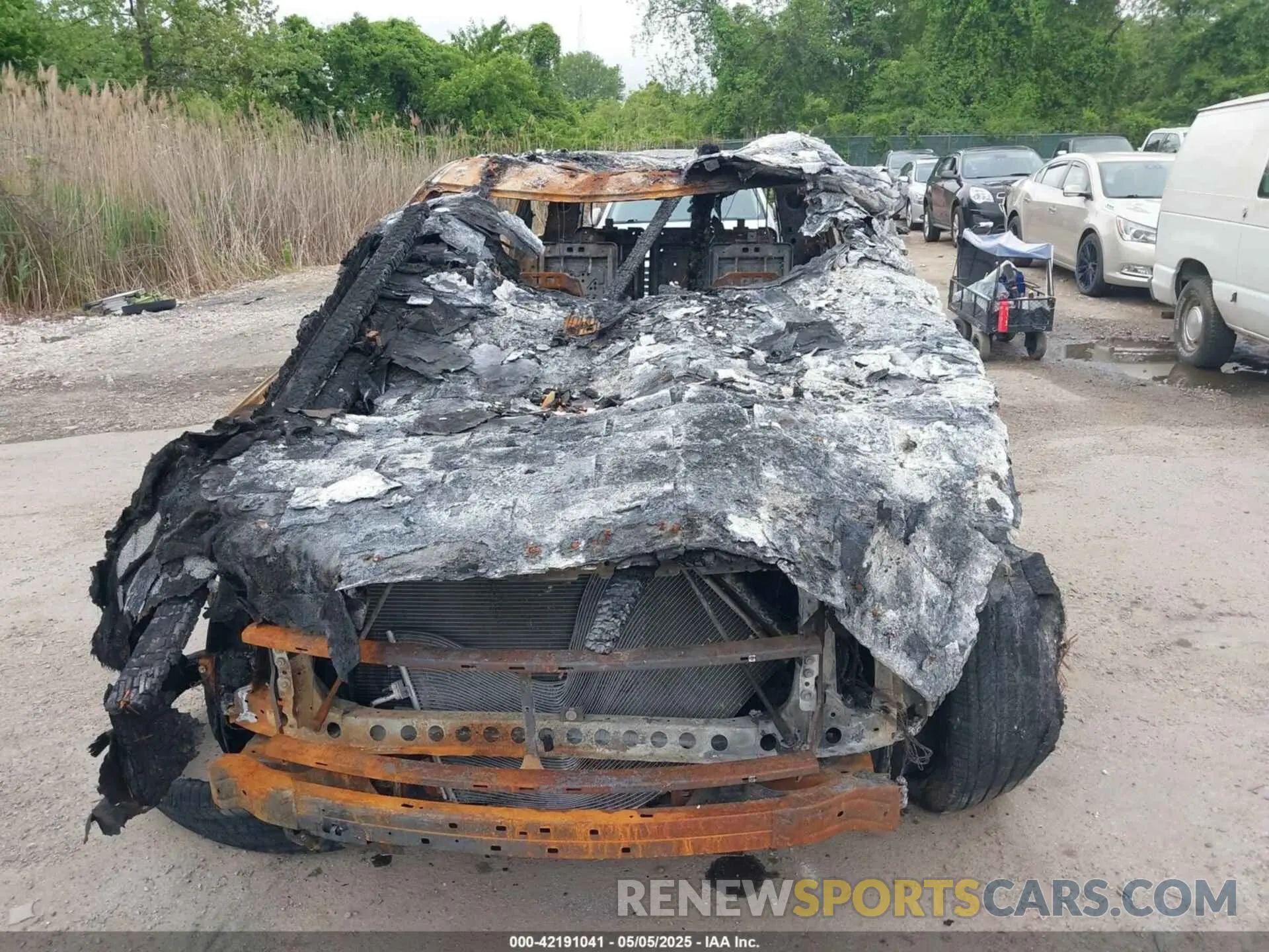 6 Photograph of a damaged car 1GNSKTKL1RR251945 CHEVROLET TAHOE 2024