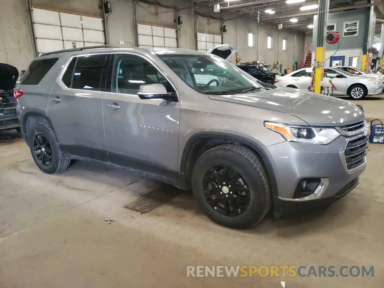4 Photograph of a damaged car 1GNEVHKW6KJ249799 CHEVROLET TRAVERSE 2019