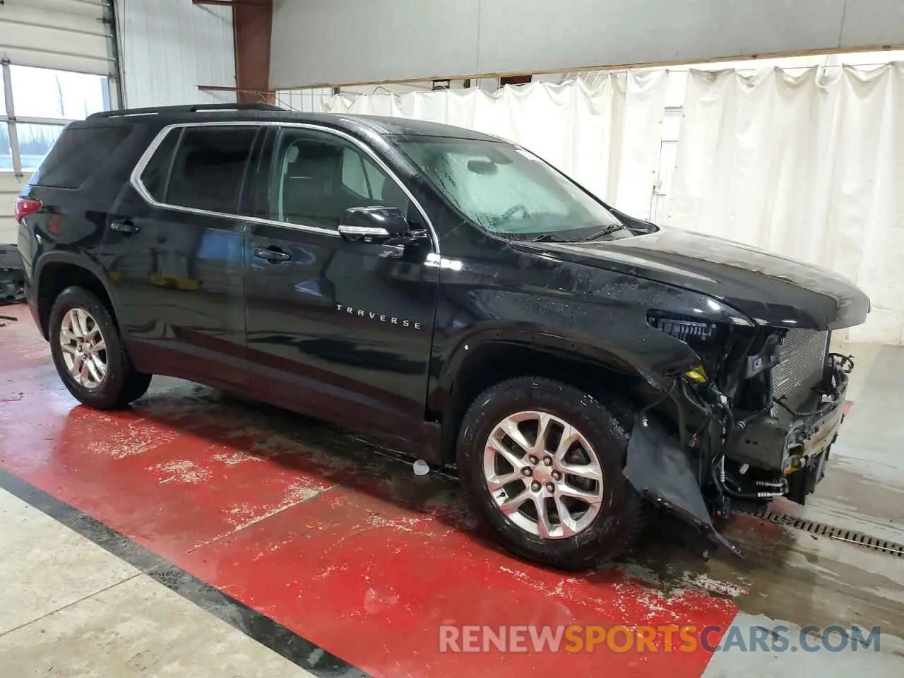 4 Photograph of a damaged car 1GNEVHKW7KJ159660 CHEVROLET TRAVERSE 2019