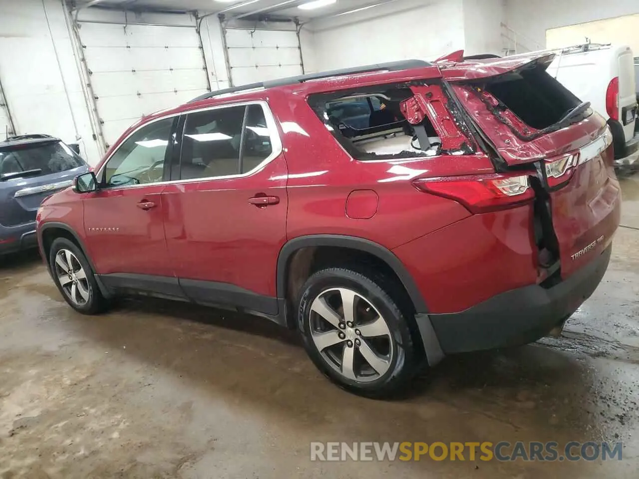 2 Photograph of a damaged car 1GNEVHKW9KJ128572 CHEVROLET TRAVERSE 2019