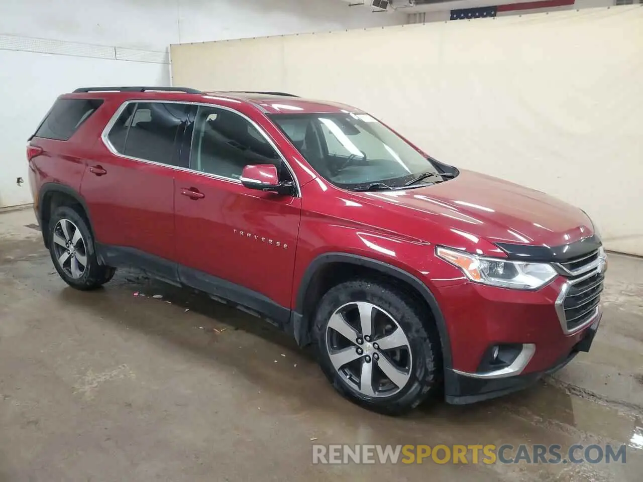 4 Photograph of a damaged car 1GNEVHKW9KJ128572 CHEVROLET TRAVERSE 2019