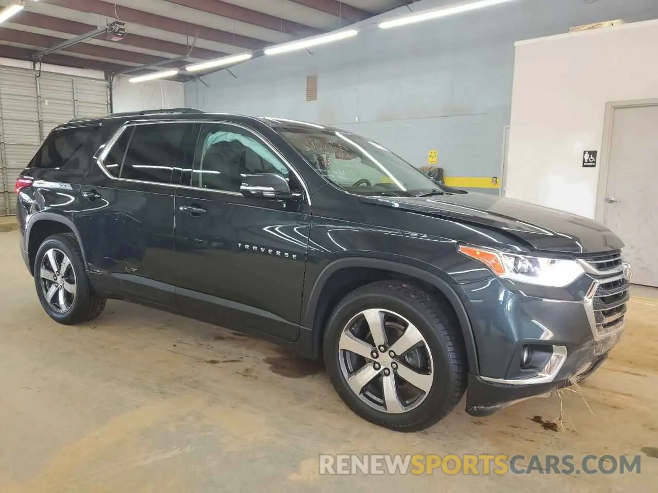4 Photograph of a damaged car 1GNEVHKWXKJ317621 CHEVROLET TRAVERSE 2019