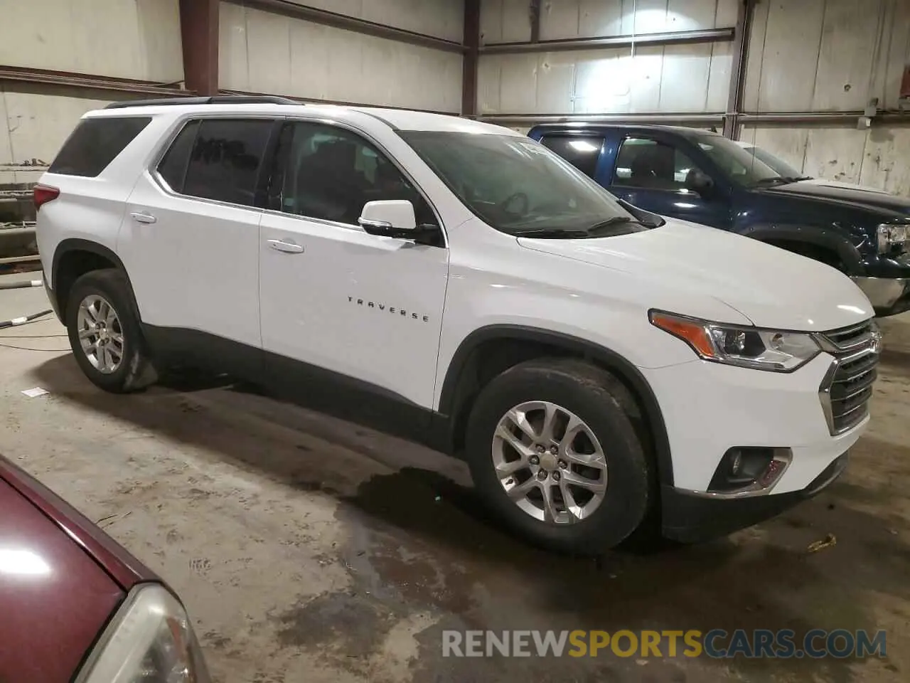 4 Photograph of a damaged car 1GNERHKW4MJ106244 CHEVROLET TRAVERSE 2021