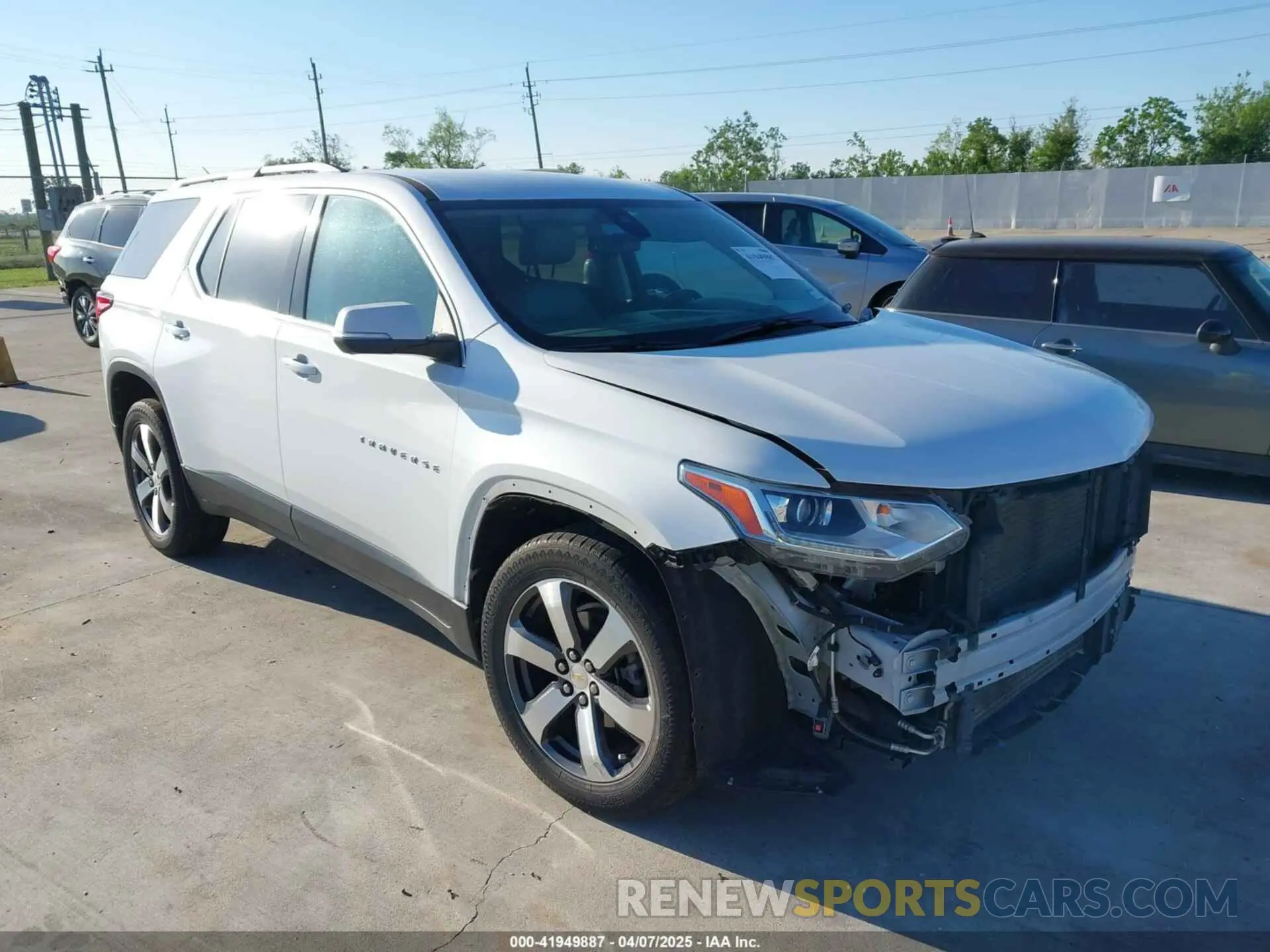 1 Photograph of a damaged car 1GNERHKWXMJ163645 CHEVROLET TRAVERSE 2021