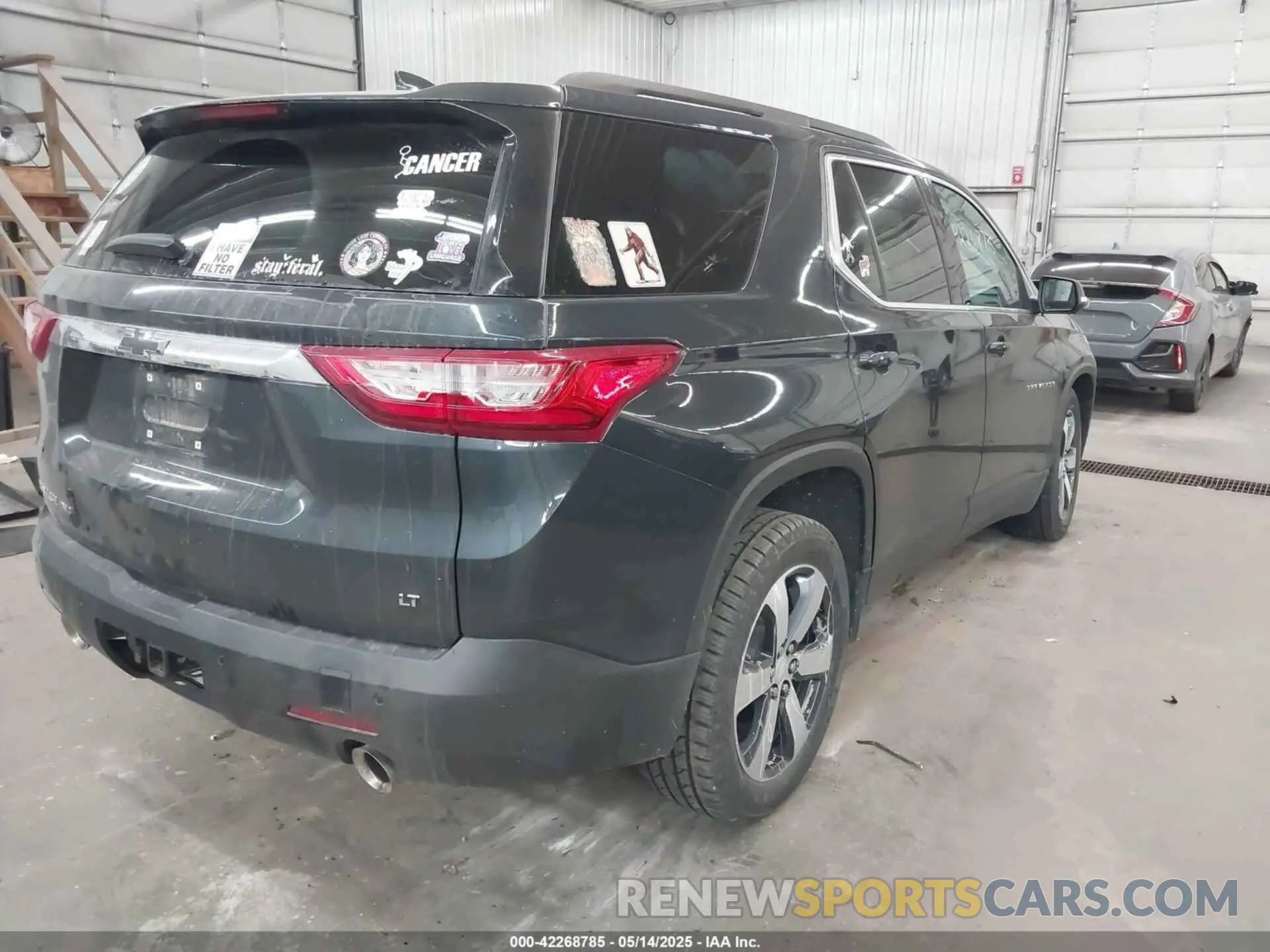 4 Photograph of a damaged car 1GNEVHKW1MJ124681 CHEVROLET TRAVERSE 2021