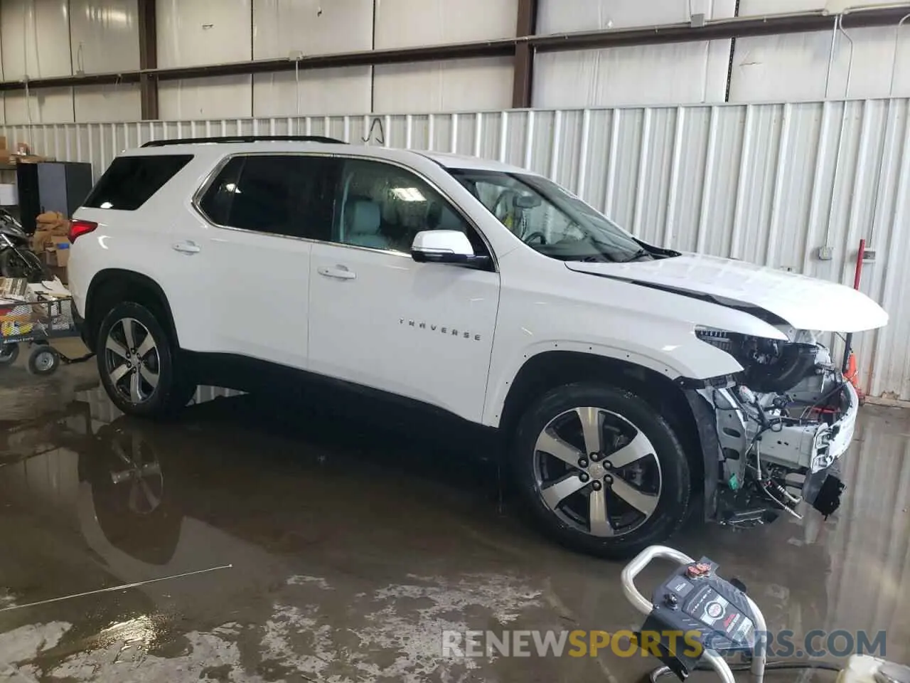 4 Photograph of a damaged car 1GNEVHKW3MJ169167 CHEVROLET TRAVERSE 2021