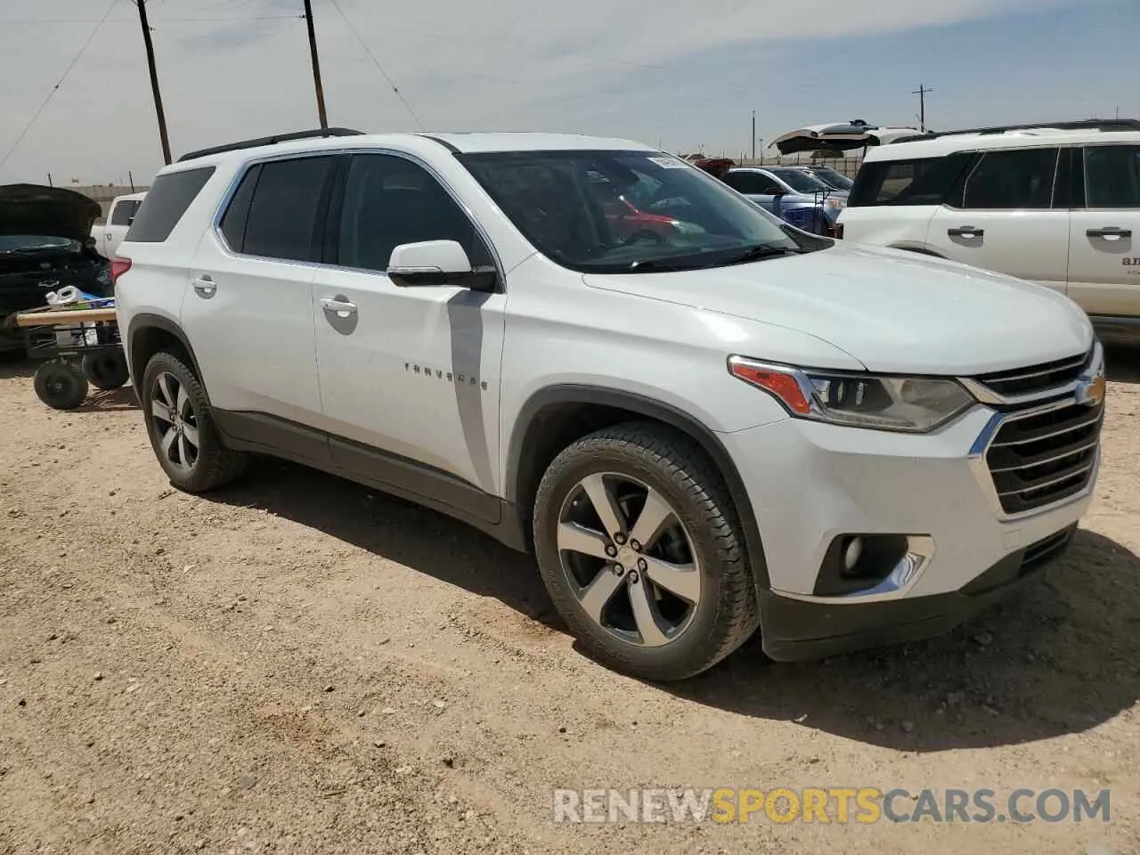 4 Photograph of a damaged car 1GNEVHKW7MJ166188 CHEVROLET TRAVERSE 2021