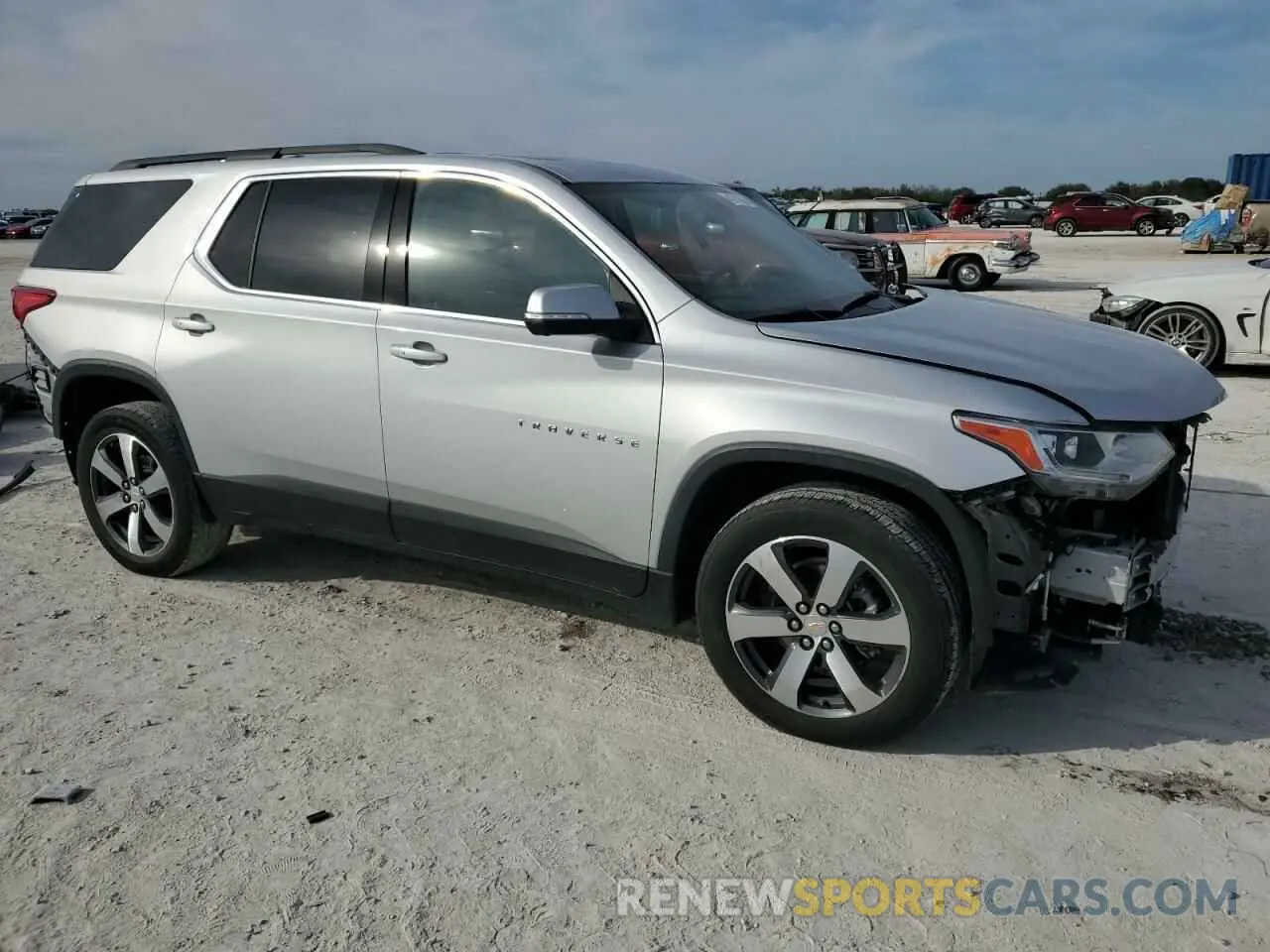 4 Photograph of a damaged car 1GNEVHKW8MJ207573 CHEVROLET TRAVERSE 2021