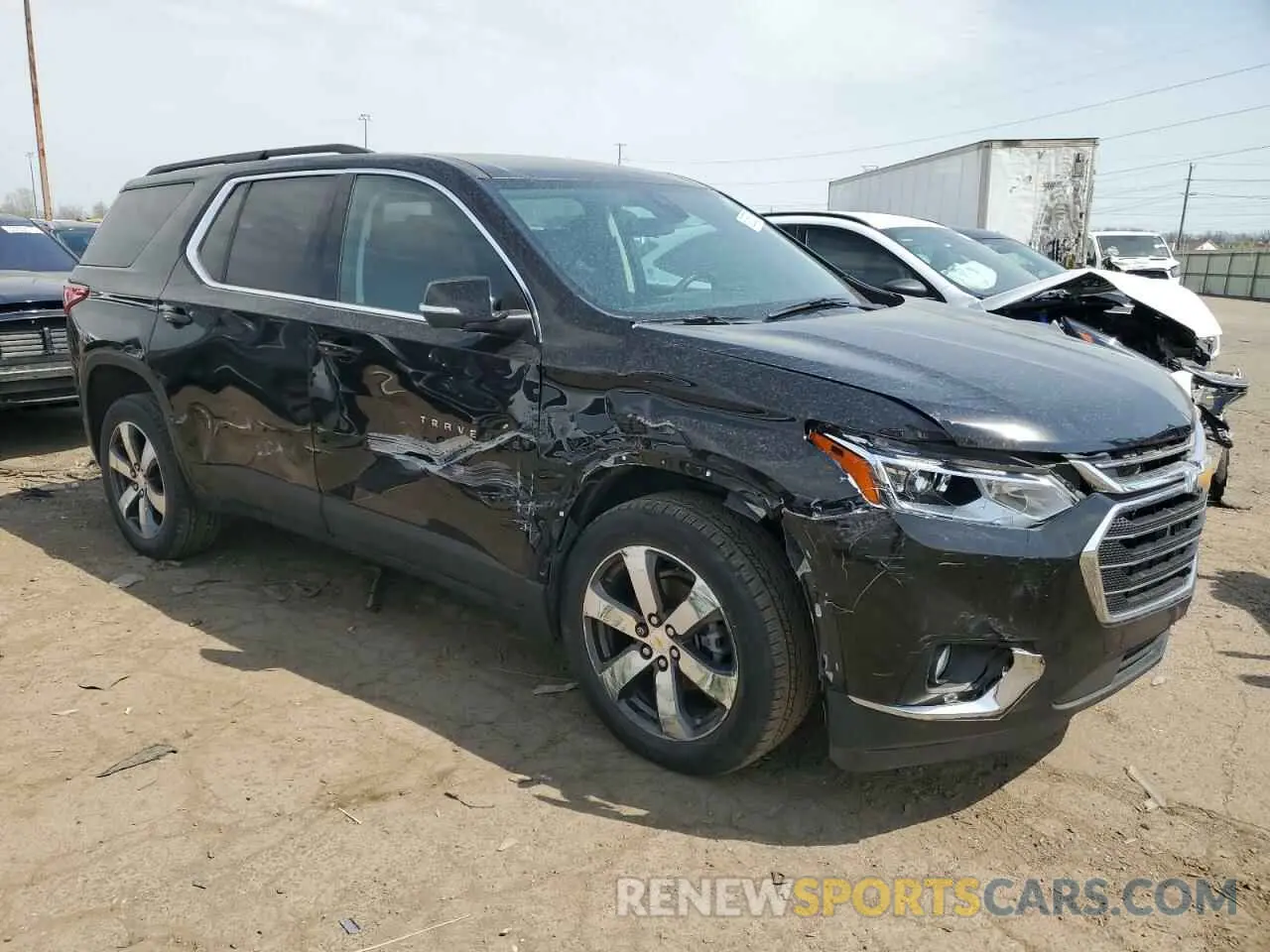 4 Photograph of a damaged car 1GNEVHKW9MJ266082 CHEVROLET TRAVERSE 2021