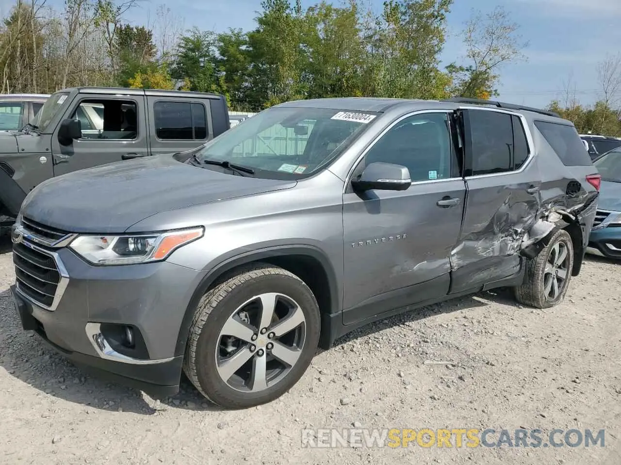 1 Photograph of a damaged car 1GNEVHKWXMJ177394 CHEVROLET TRAVERSE 2021