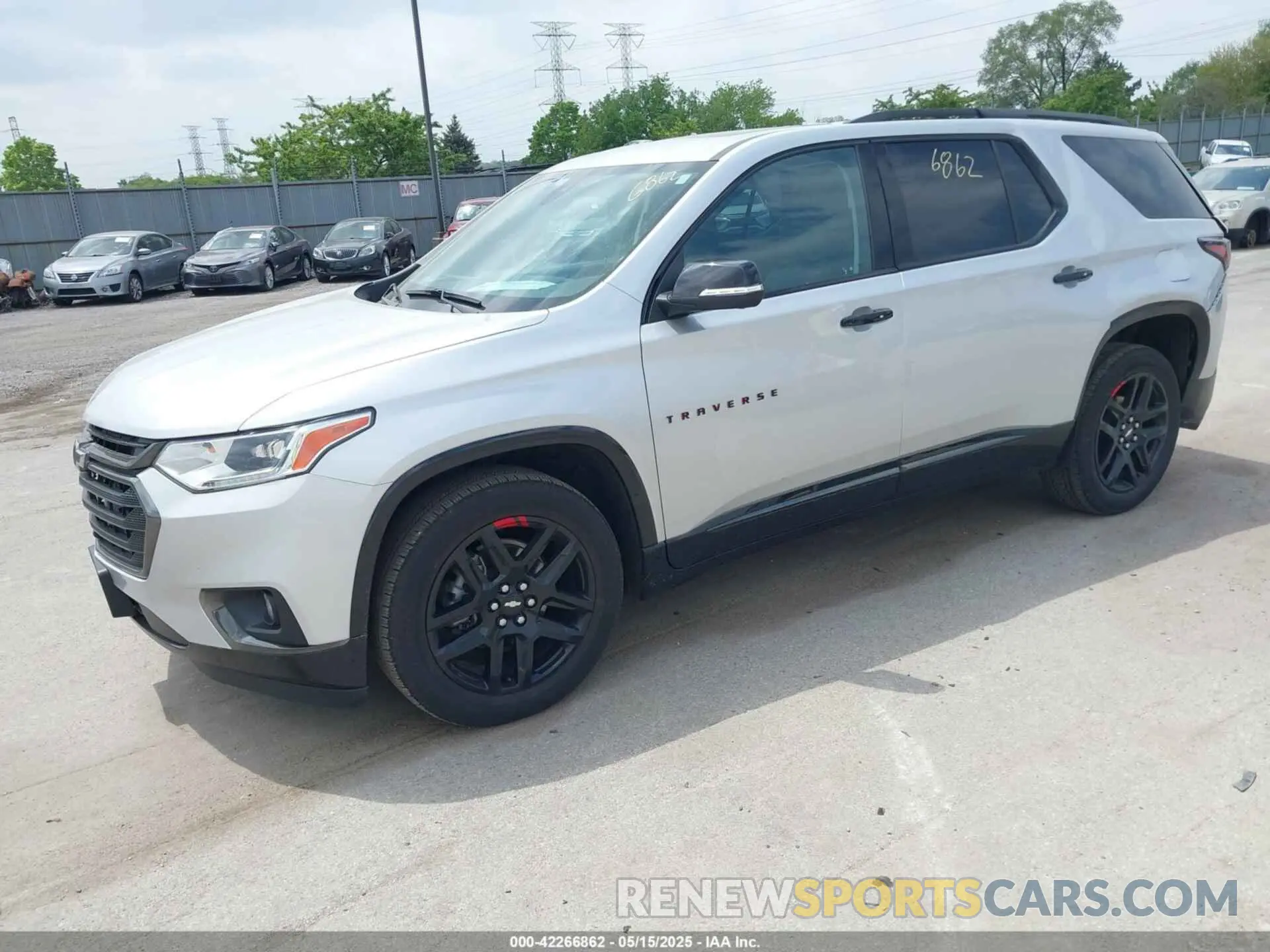 2 Photograph of a damaged car 1GNEVKKWXMJ159359 CHEVROLET TRAVERSE 2021