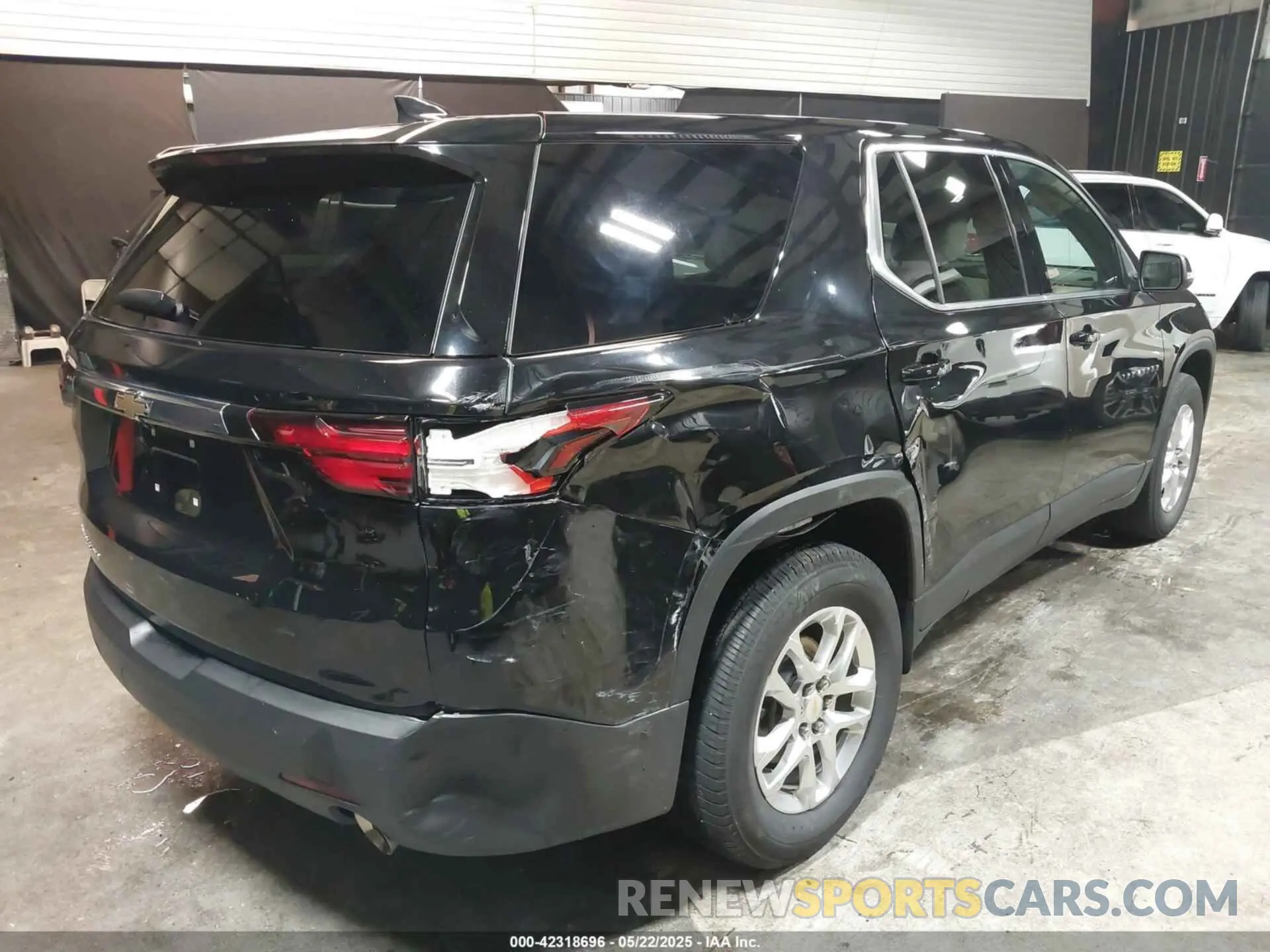4 Photograph of a damaged car 1GNEVFKW4PJ206915 CHEVROLET TRAVERSE 2023