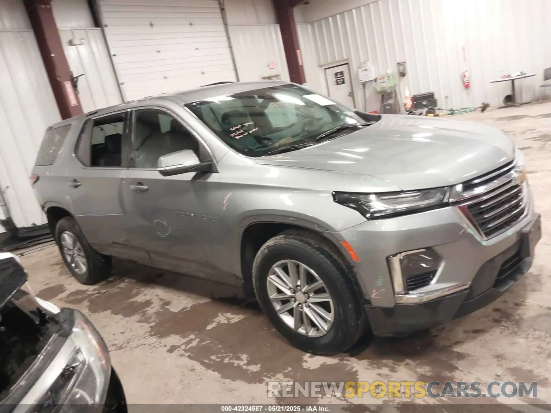 13 Photograph of a damaged car 1GNEVHKW6PJ226546 CHEVROLET TRAVERSE 2023