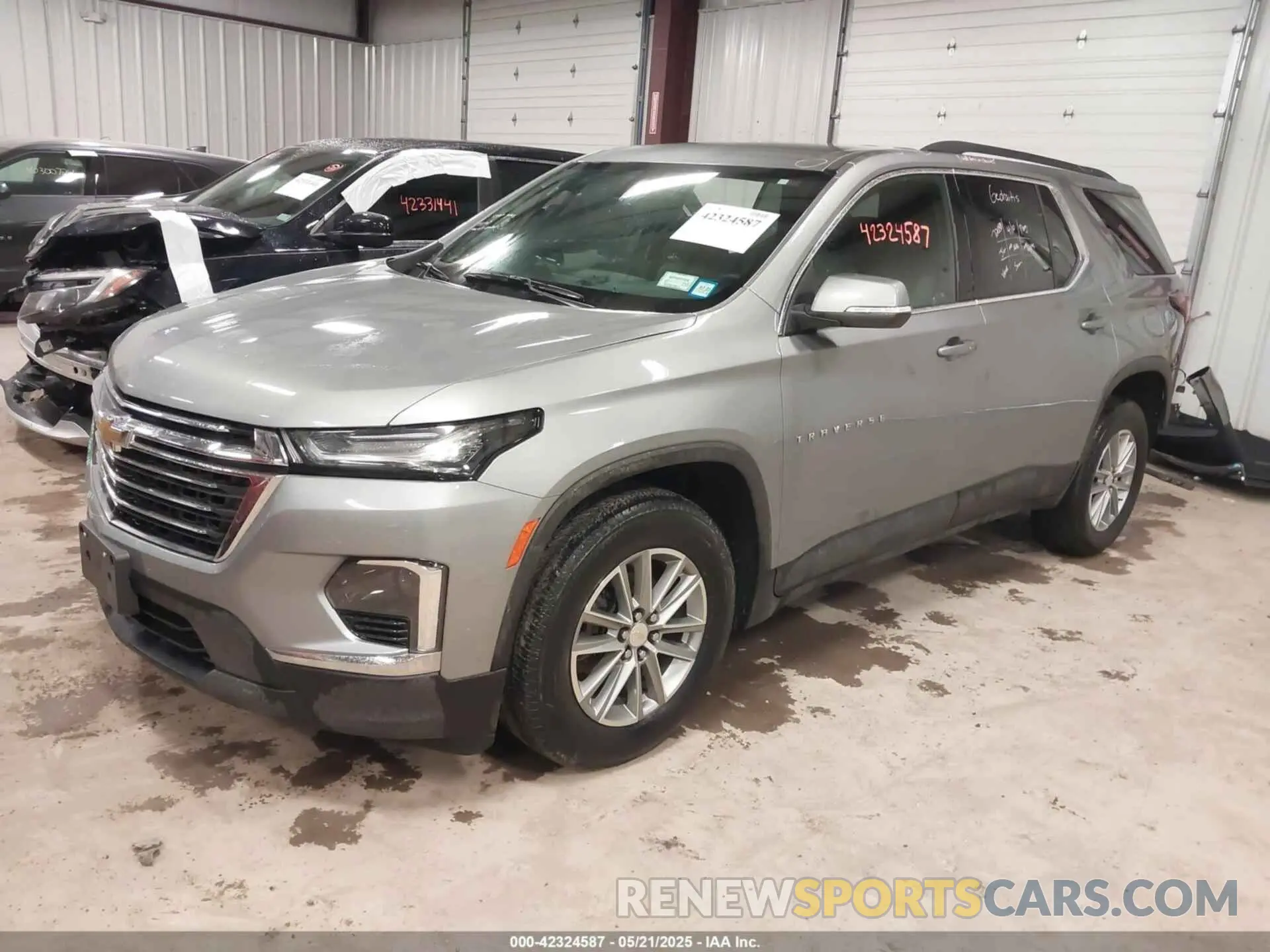 2 Photograph of a damaged car 1GNEVHKW6PJ226546 CHEVROLET TRAVERSE 2023