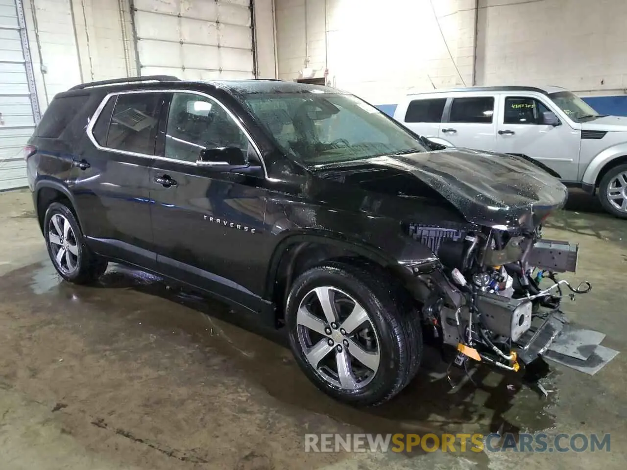 4 Photograph of a damaged car 1GNEVHKWXPJ323801 CHEVROLET TRAVERSE 2023
