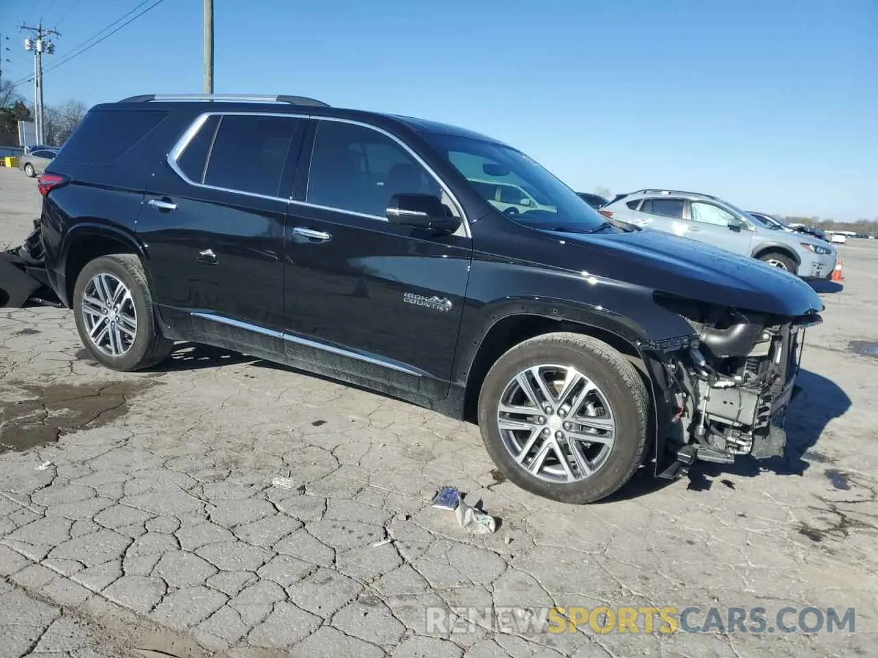 4 Photograph of a damaged car 1GNEVNKW4PJ275677 CHEVROLET TRAVERSE 2023