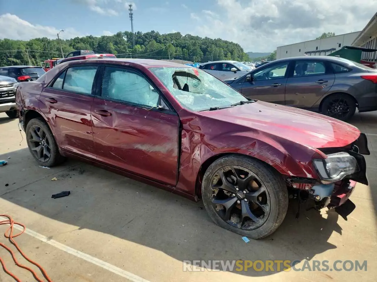 4 Photograph of a damaged car 2C3CCAAG4PH538250 CHRYSLER 300 2023