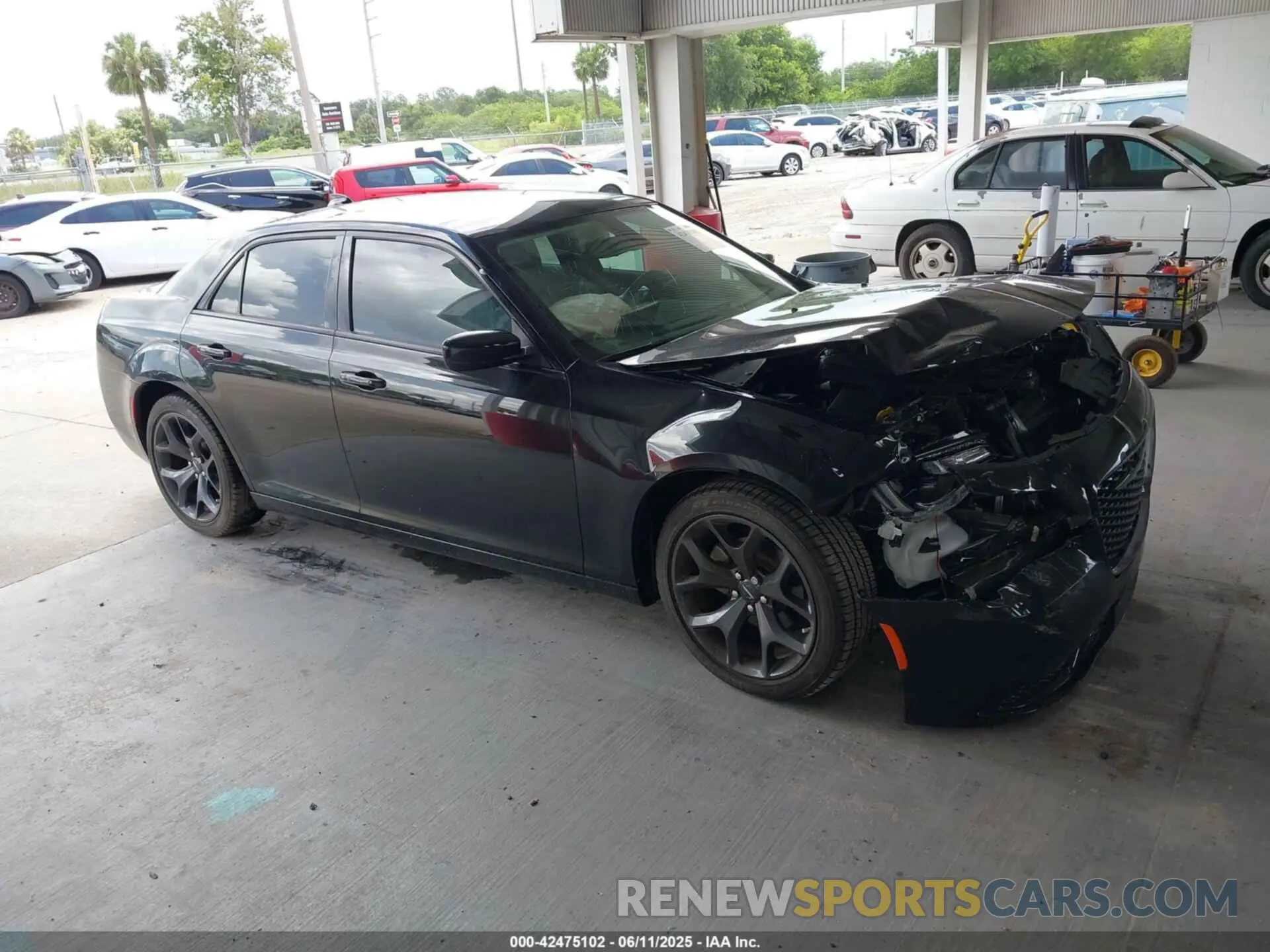 13 Photograph of a damaged car 2C3CCAAG7PH661833 CHRYSLER 300 2023