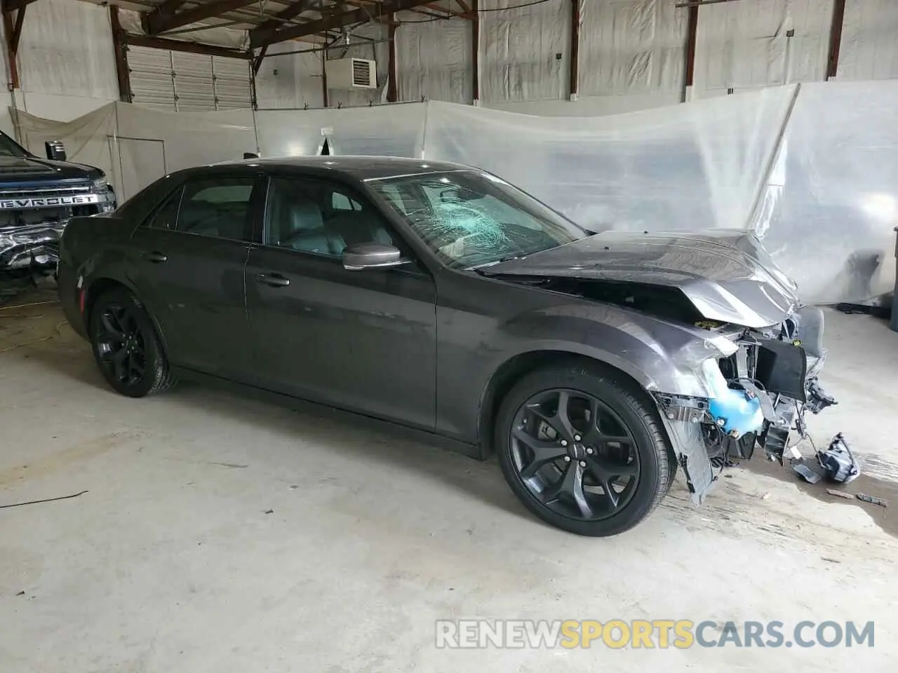 4 Photograph of a damaged car 2C3CCABG5PH569618 CHRYSLER 300 2023