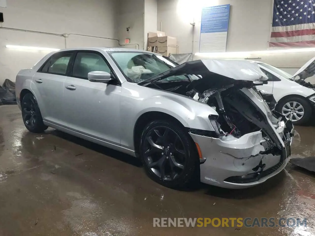4 Photograph of a damaged car 2C3CCABG7PH565442 CHRYSLER 300 2023