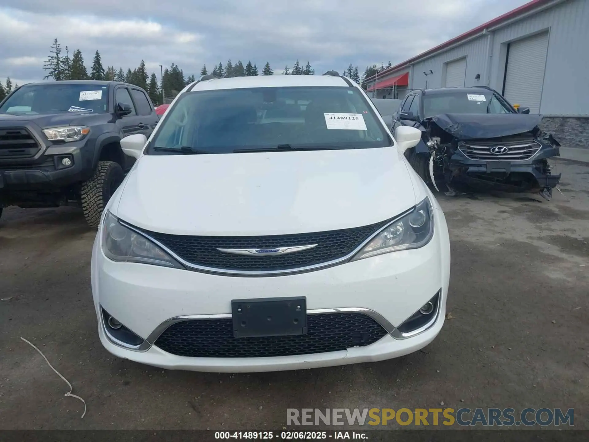 12 Photograph of a damaged car 2C4RC1BG7KR613188 CHRYSLER PACIFICA 2019