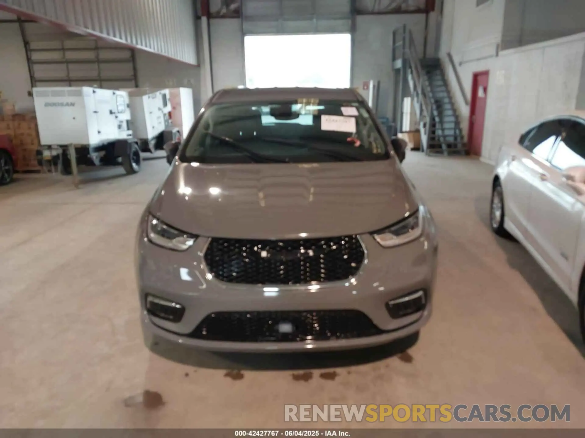 12 Photograph of a damaged car 2C4RC1BG8PR581505 CHRYSLER PACIFICA 2023