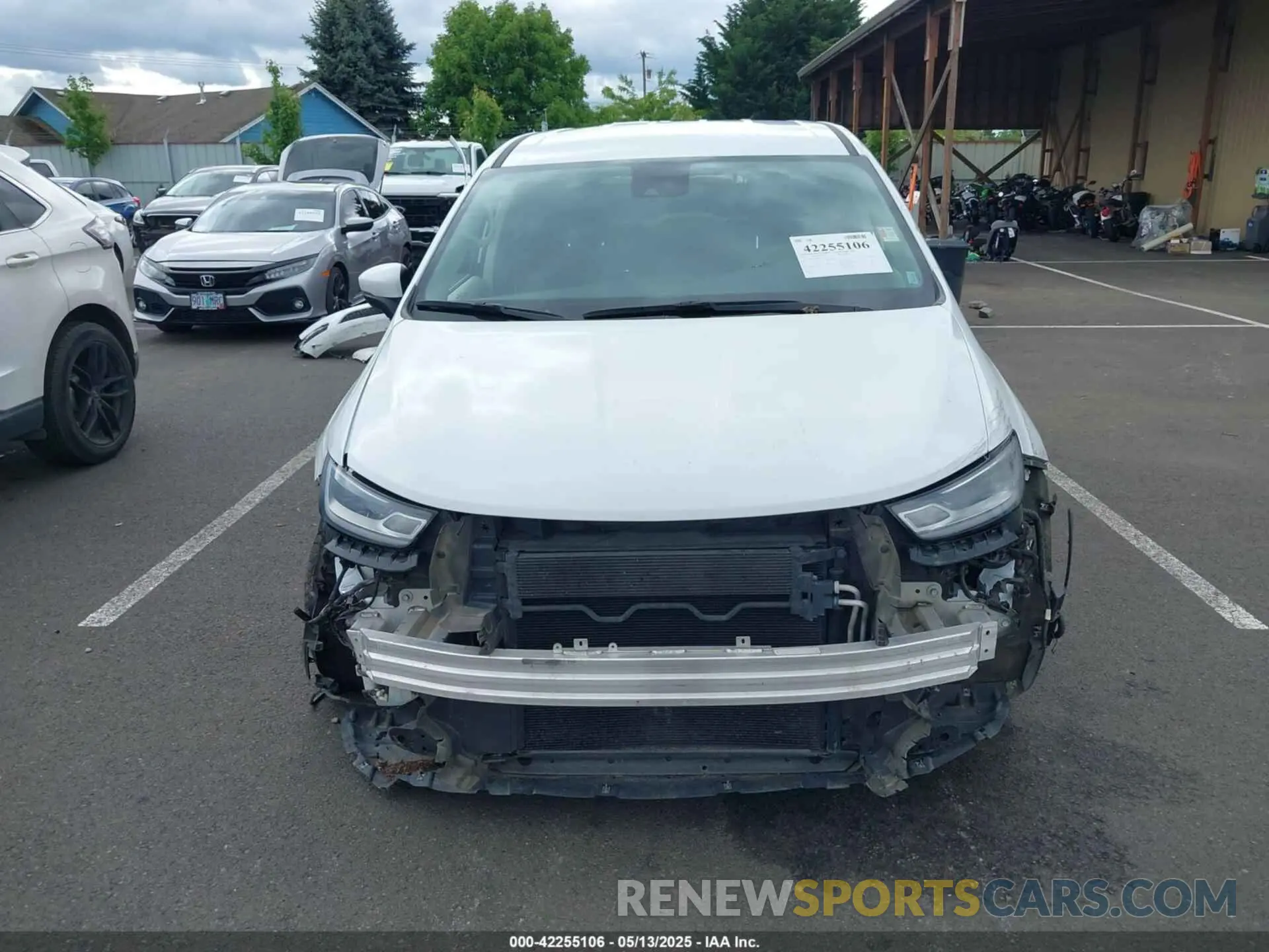 13 Photograph of a damaged car 2C4RC1BG9PR521572 CHRYSLER PACIFICA 2023