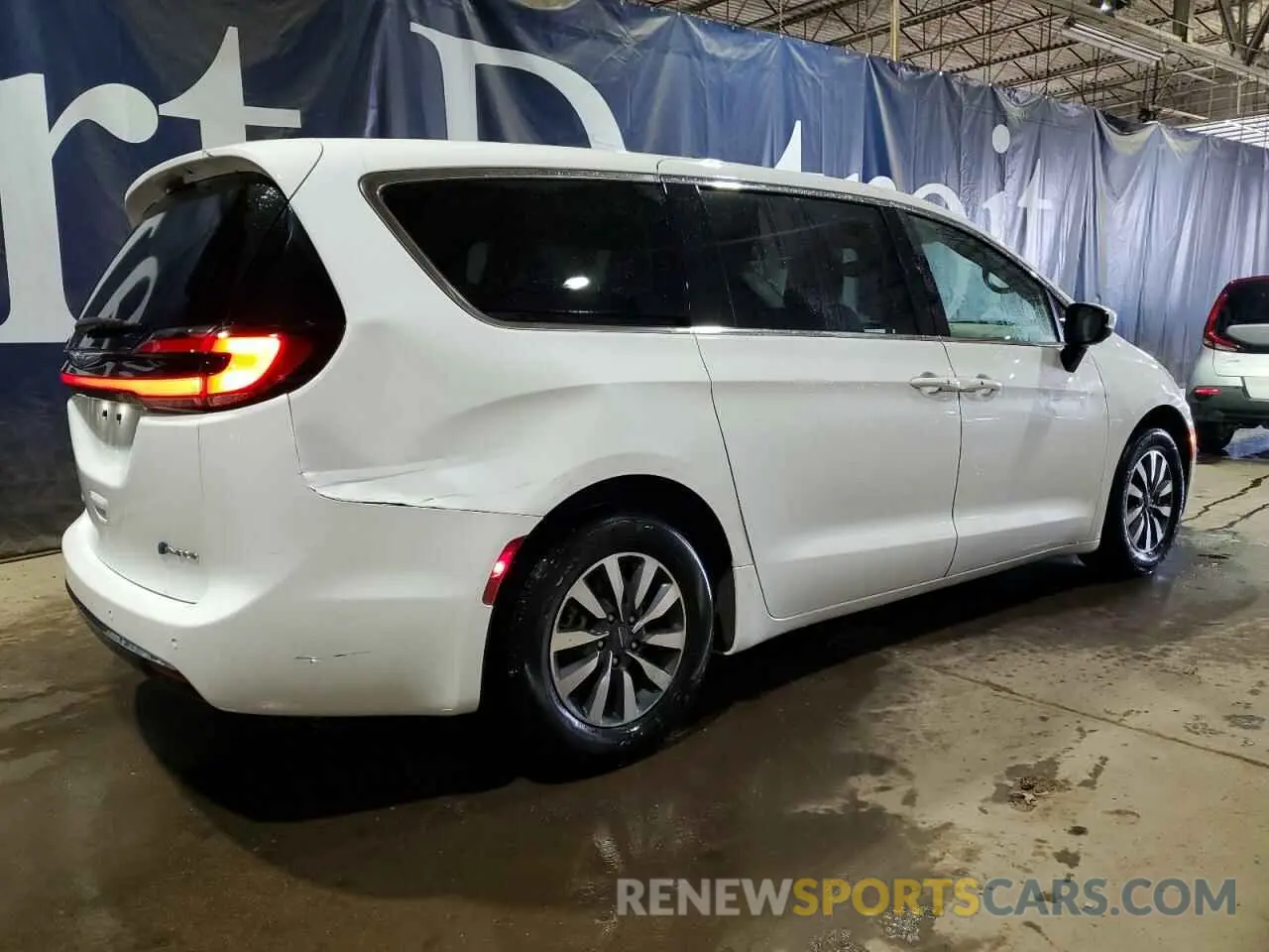 3 Photograph of a damaged car 2C4RC1L72PR562270 CHRYSLER PACIFICA 2023