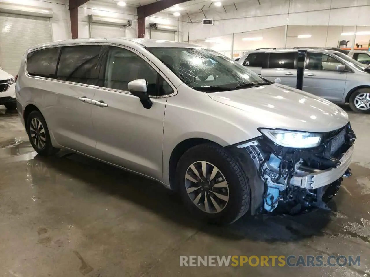 4 Photograph of a damaged car 2C4RC1L79PR626126 CHRYSLER PACIFICA 2023