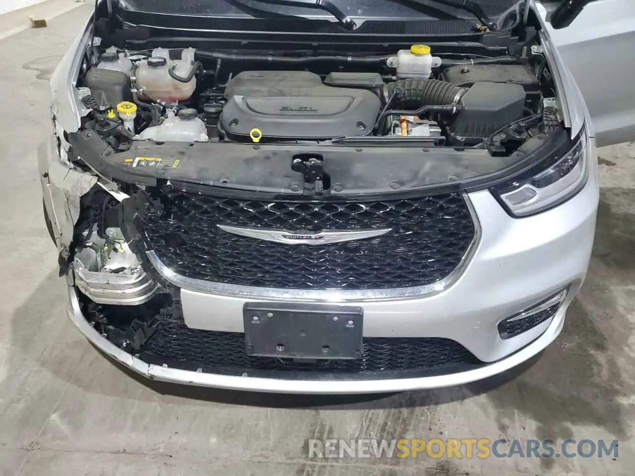 12 Photograph of a damaged car 2C4RC1S74RR156818 CHRYSLER PACIFICA 2024