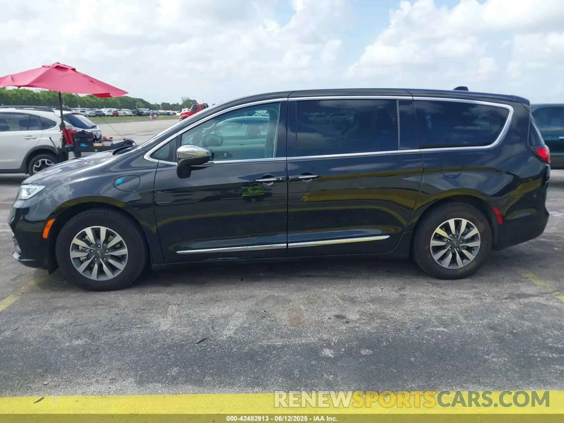 14 Photograph of a damaged car 2C4RC1S73PR541980 CHRYSLER PACIFICA HYBRID 2023