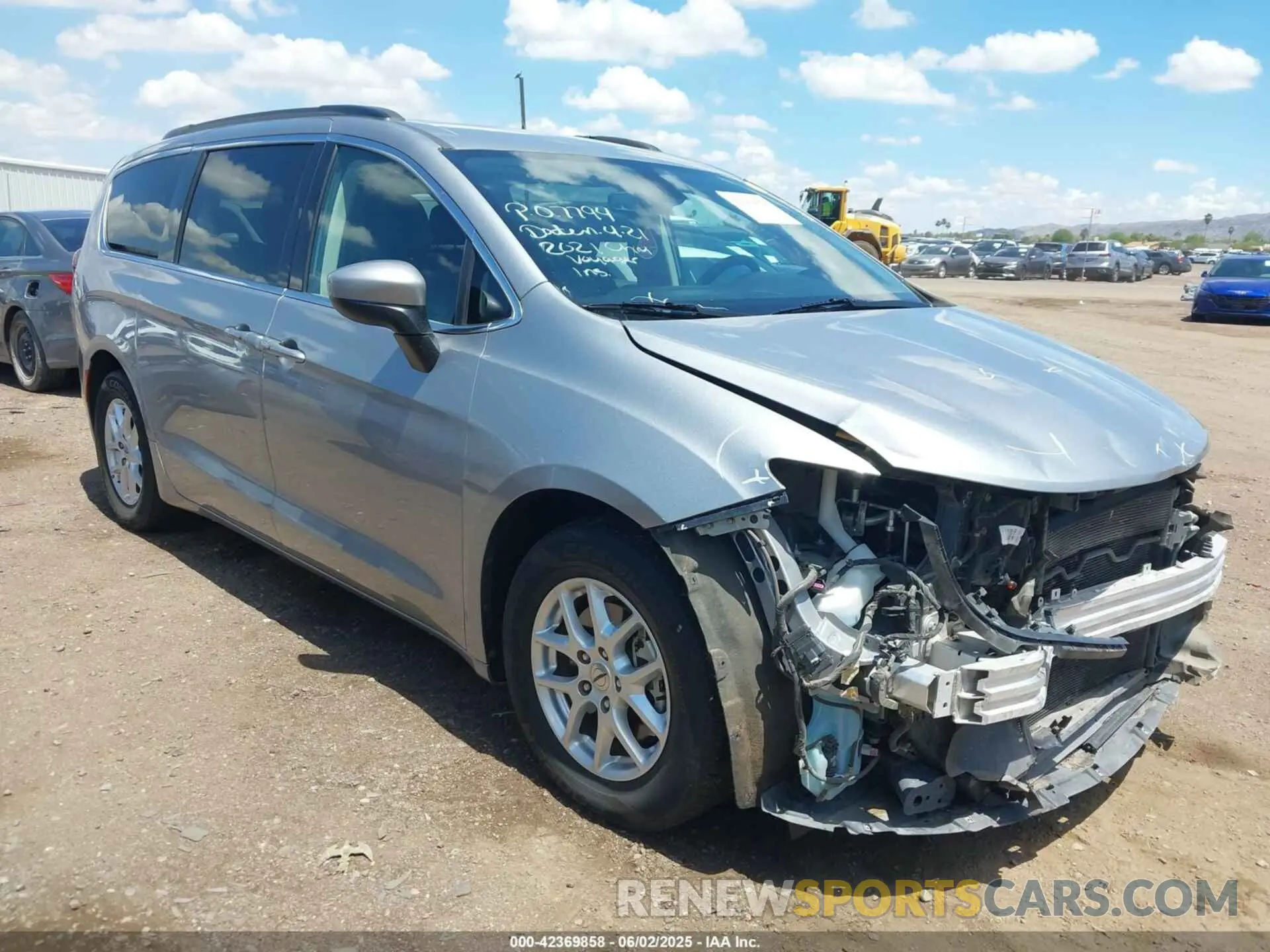 1 Photograph of a damaged car 2C4RC1DG2MR517002 CHRYSLER VOYAGER 2021