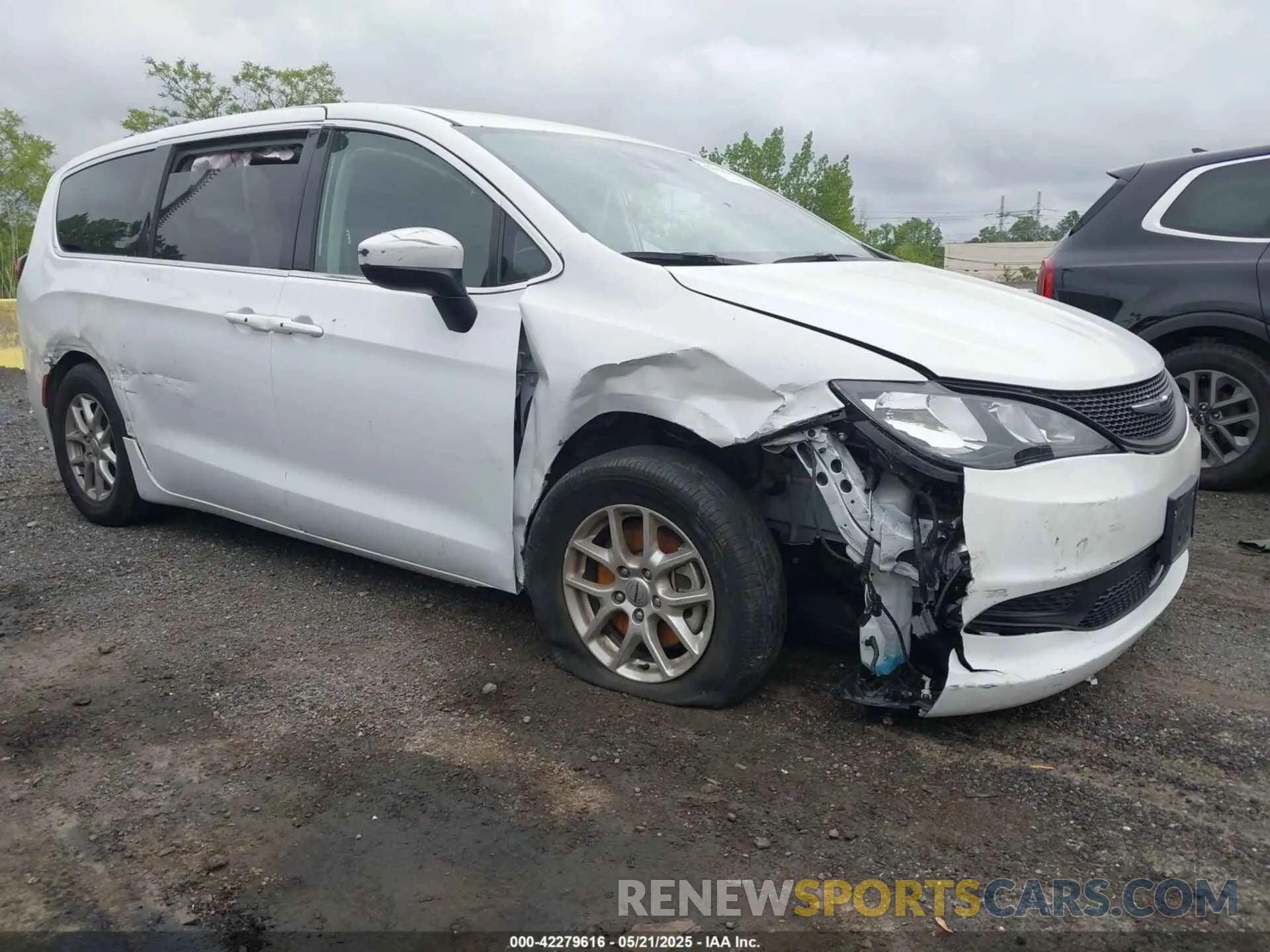 1 Photograph of a damaged car 2C4RC1CG1PR568285 CHRYSLER VOYAGER 2023