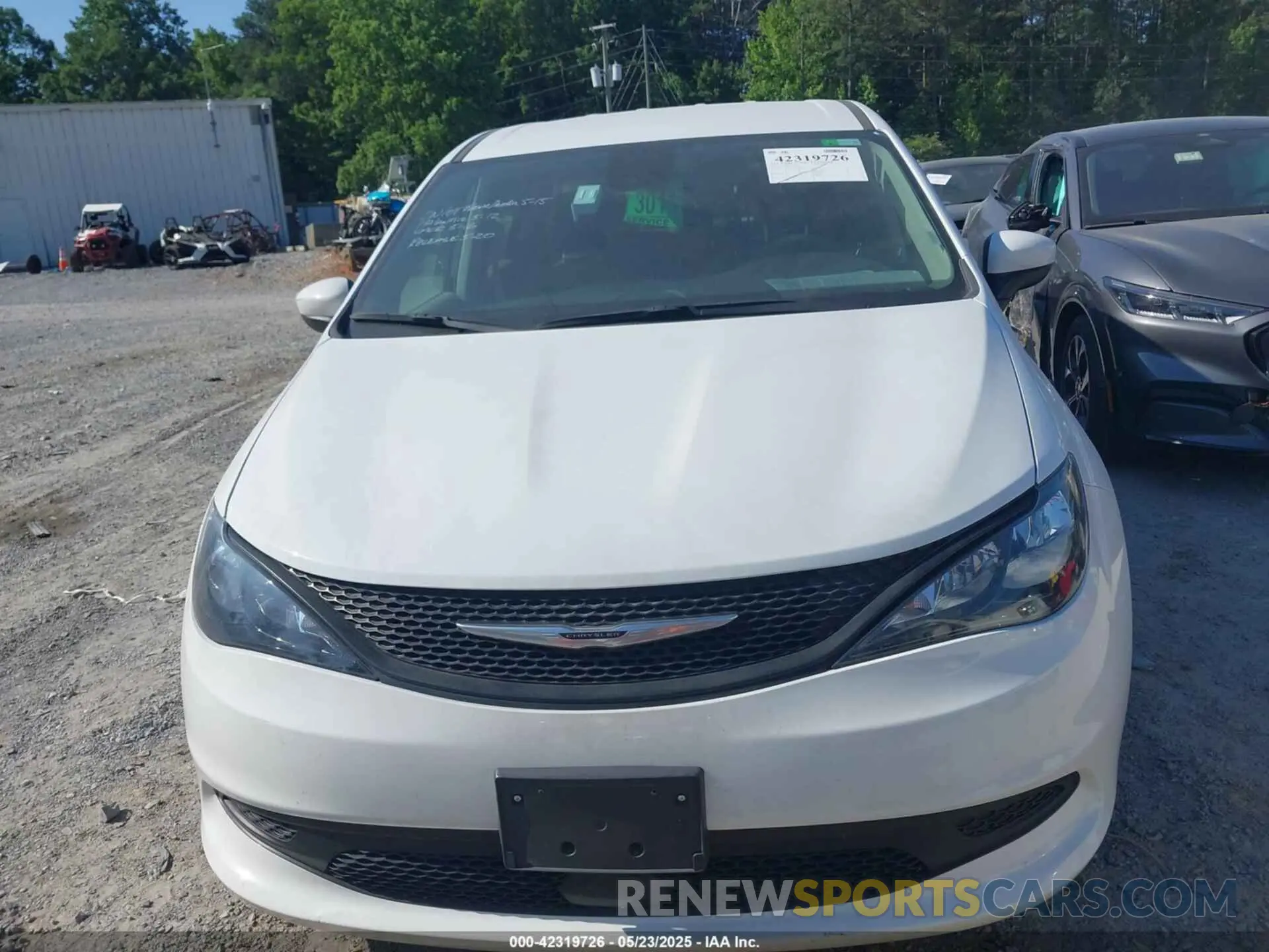 12 Photograph of a damaged car 2C4RC1CG2PR547672 CHRYSLER VOYAGER 2023